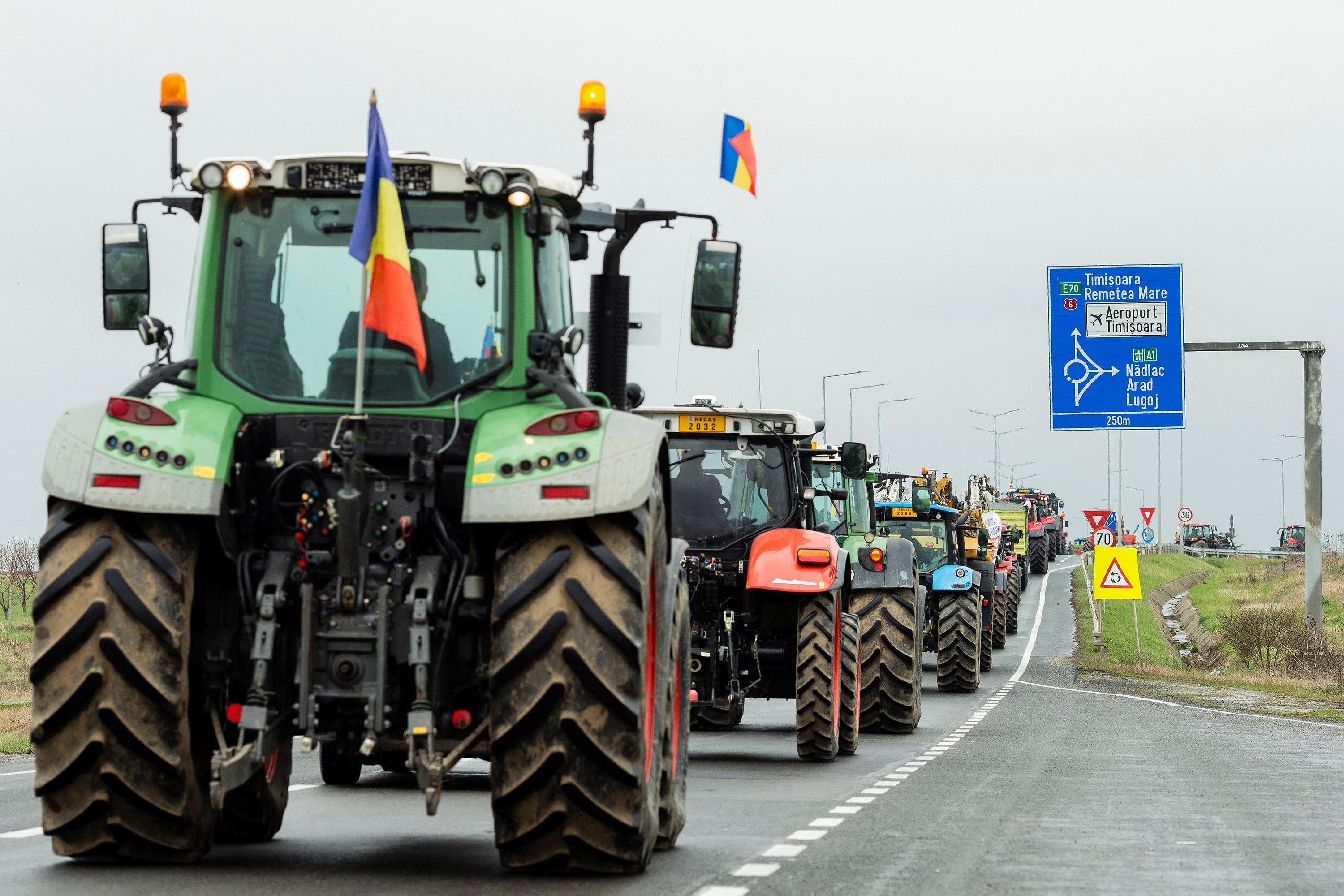 Romanian farmers protest in their tractors Friday, April 7.