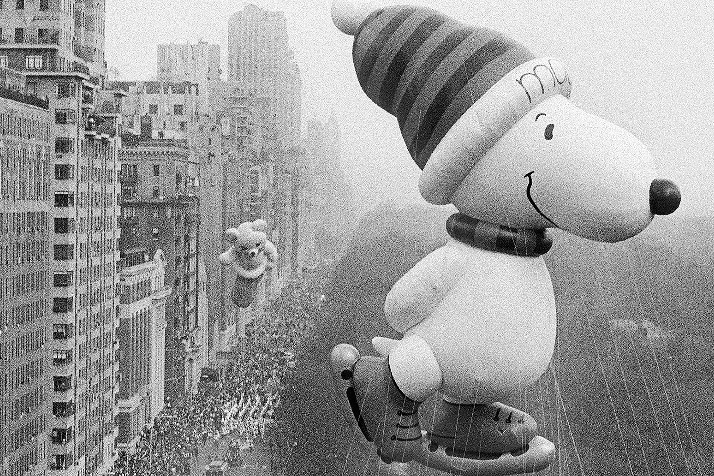 The Snoopy balloon rounds Columbus Circle during the annual Macy's Thanksgiving Day Parade in New York in 1987.