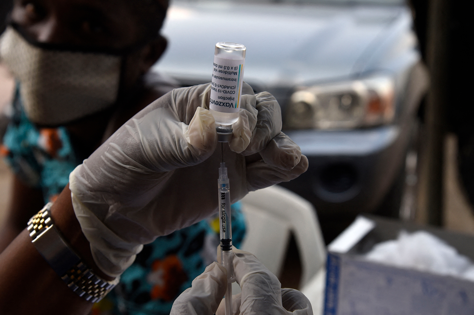 A health worker prepares a Covid-19 vaccine dose in Lagos, Nigeria, on November 26. 