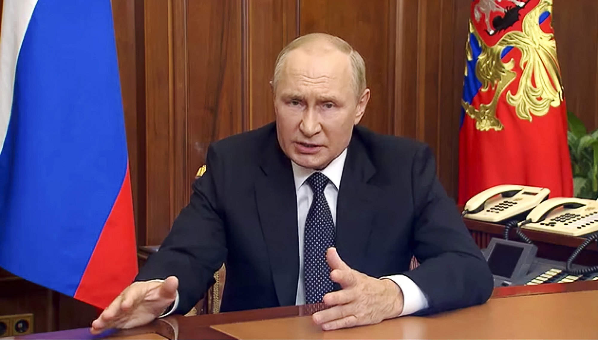 In this image made from video released by the Russian Presidential Press Service, Russian President Vladimir Putin gestures as he addresses the nation in Moscow, Russia, on September 21.