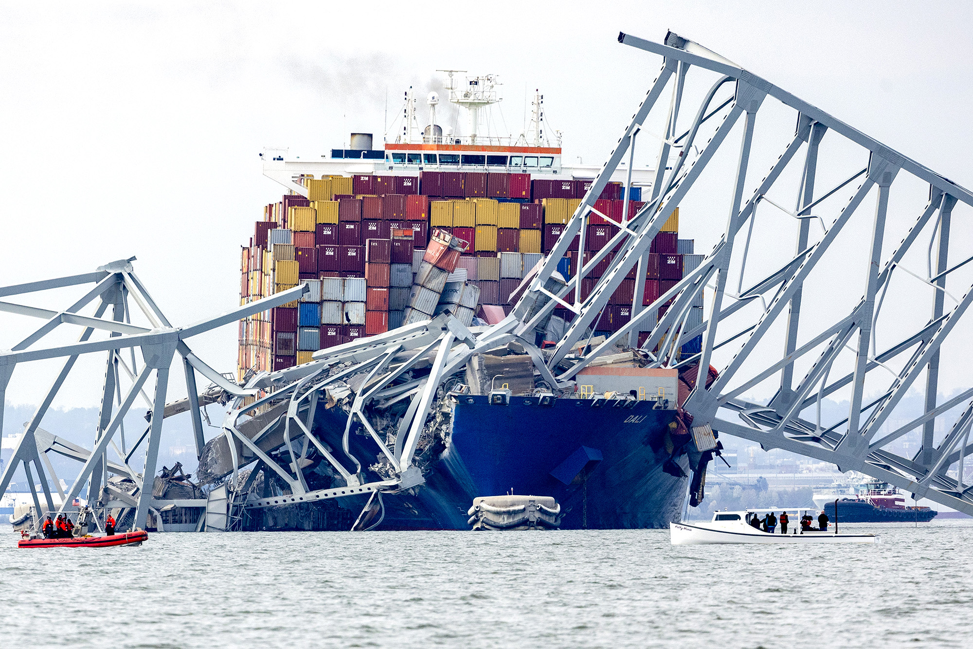 The cargo ship Dali sits in the water after running into and collapsing the Francis Scott Key Bridge on March 26, in Baltimore, Maryland. 