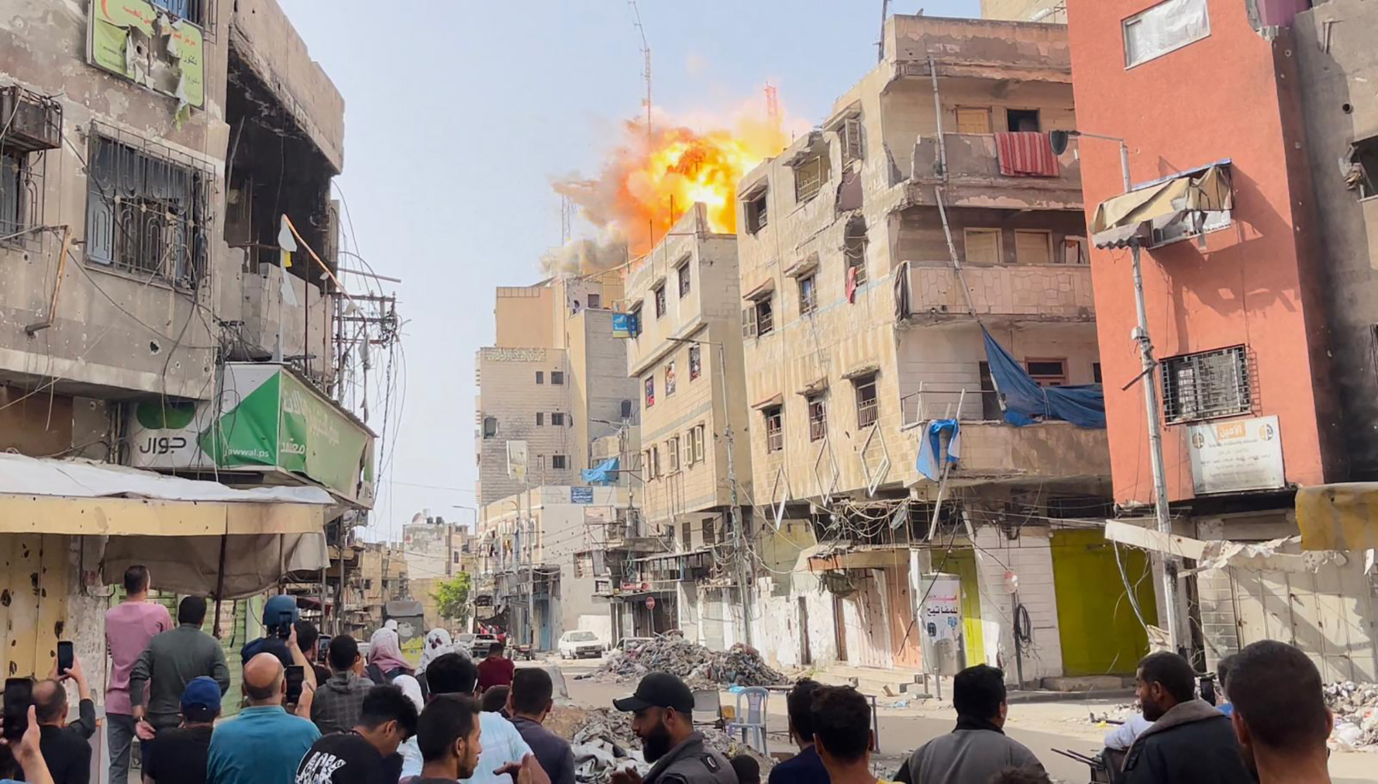 Smoke rises above the al-Sahaba building after an attack by the Israeli army in the al-Daraj neighborhood, Gaza, on April 22.