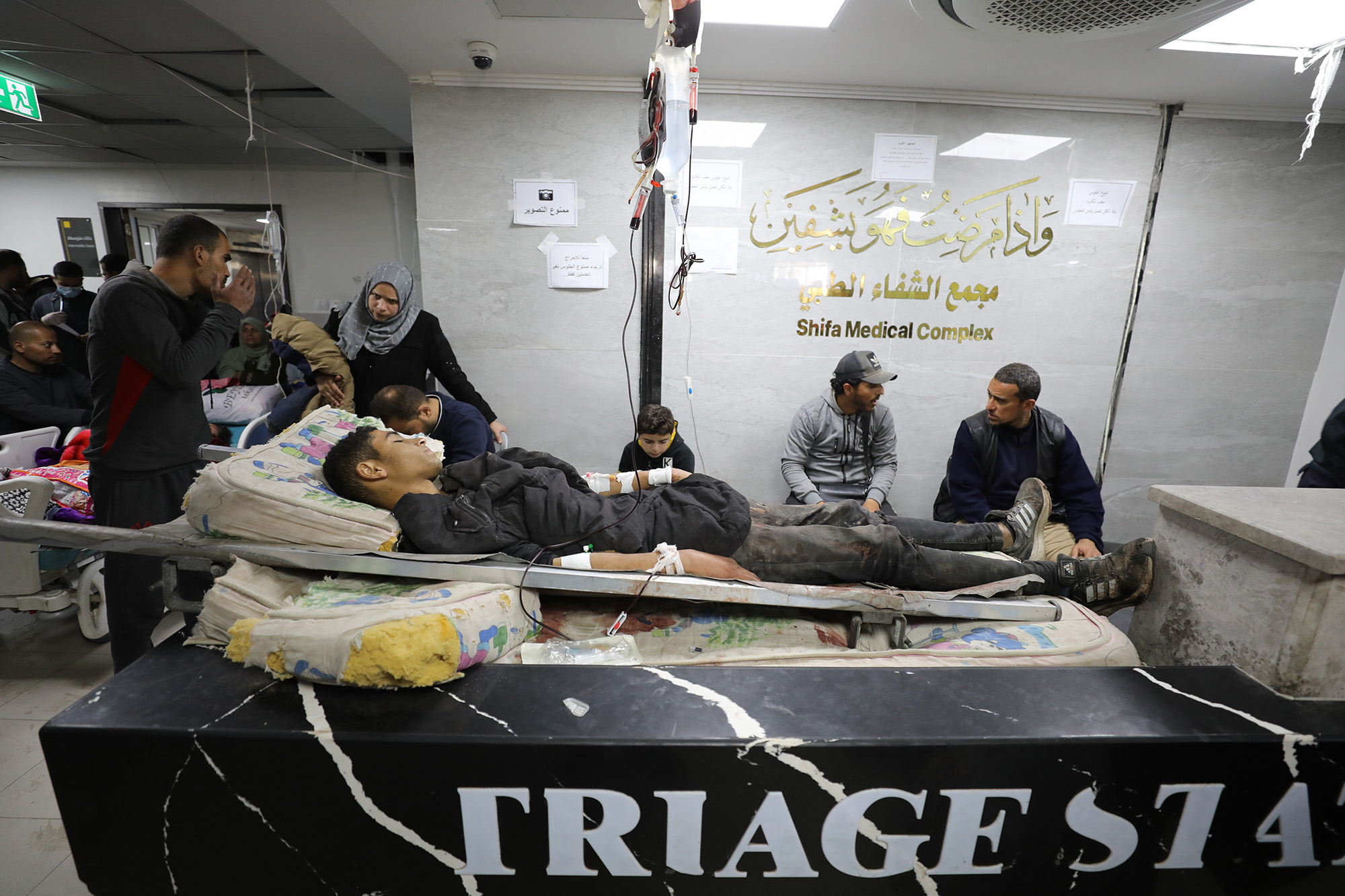 Injured Palestinians receive medical treatment in Al-Shifa Hospital after Israeli forces open fire on Palestinians waiting for humanitarian aid trucks at Al-Rashid Street in Gaza on February 29.