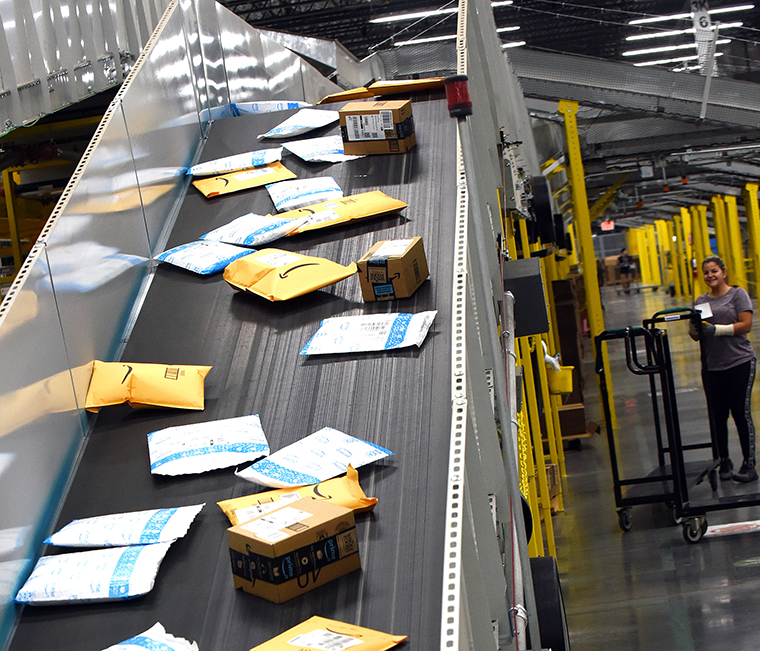 Amazon warehouses are getting hit with coronavirus cases 
