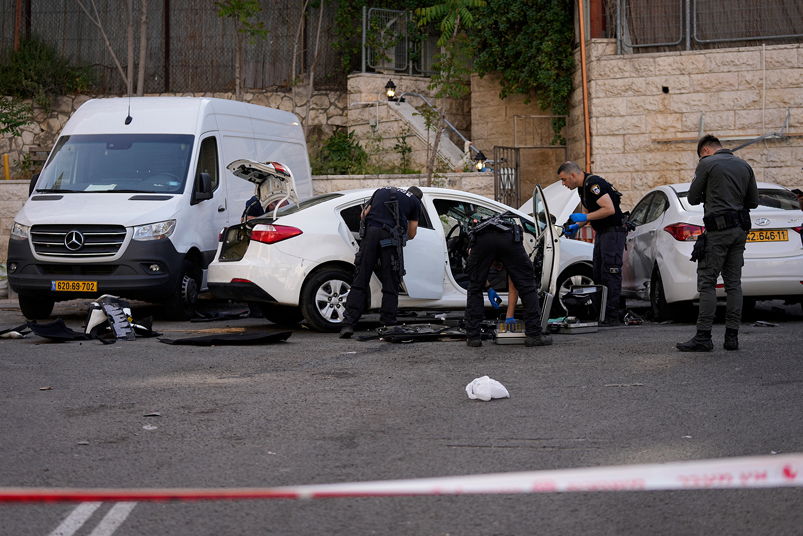 Israeli police investigate the scene of a suspected ramming attack that wounded three people on the eve of the Jewish holiday of Passover, in Jerusalem, on April 22.