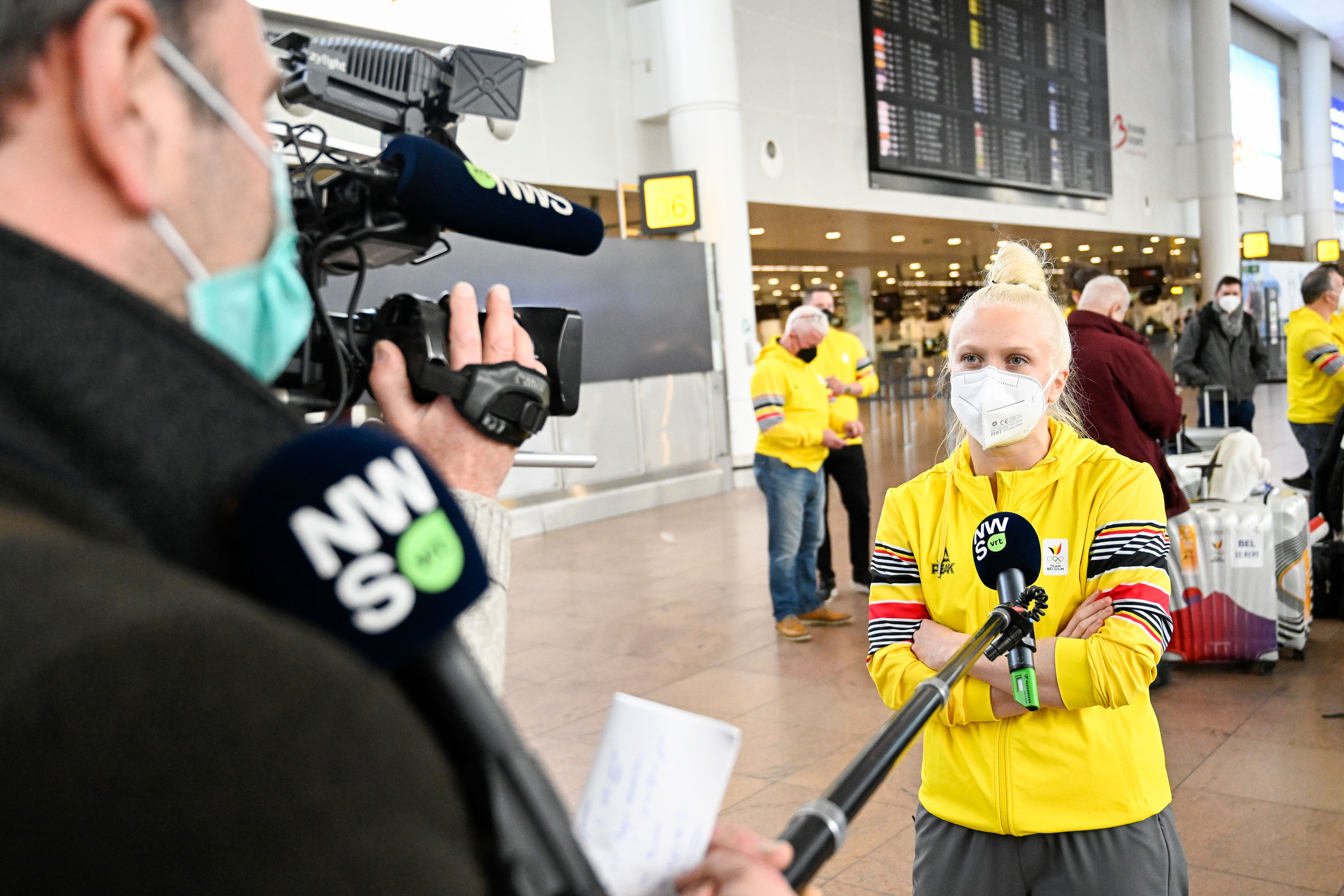 Kim Meylemans speaks to press at the Brussels Airport in Zaventem, Brussels, before leaving for Beijing on January 29.