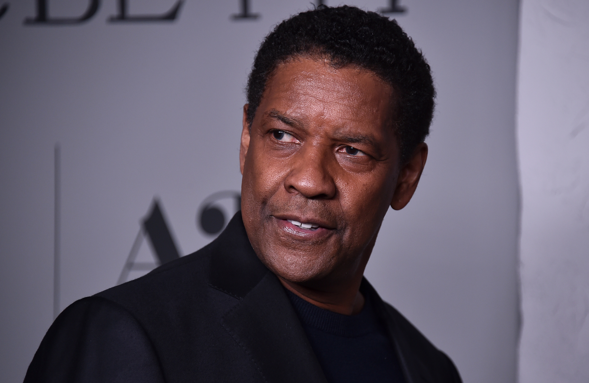 Denzel Washington arrives at the premiere of "The Tragedy of Macbeth" at the DGA Theater on December 18, 2021, in Los Angeles. 