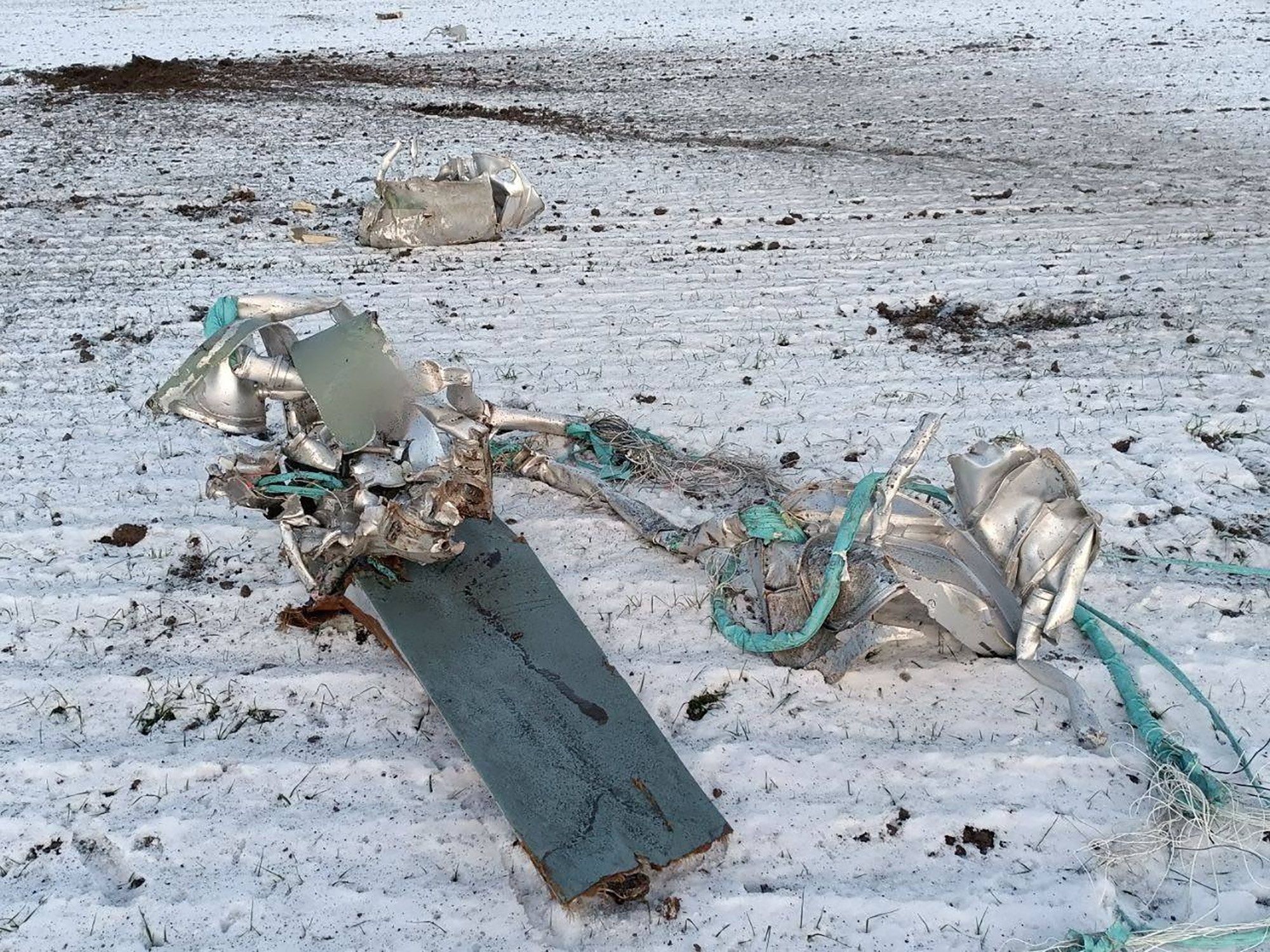 Parts of a Russian cruise missile shot down by the Ukrainian Air Defence Forces are seen in a field in the Kyiv region, Ukraine, on December 5.