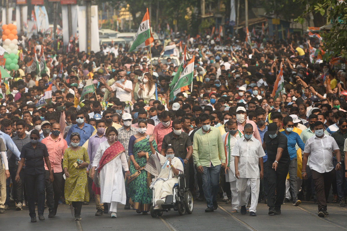Chief minister of West Bengal and Trinamool Congress leader Mamata Banerjee is seen at the center of an election rally with TMC candidates from Beleghata to Bowbazar on April 15 in Kolkata, India.