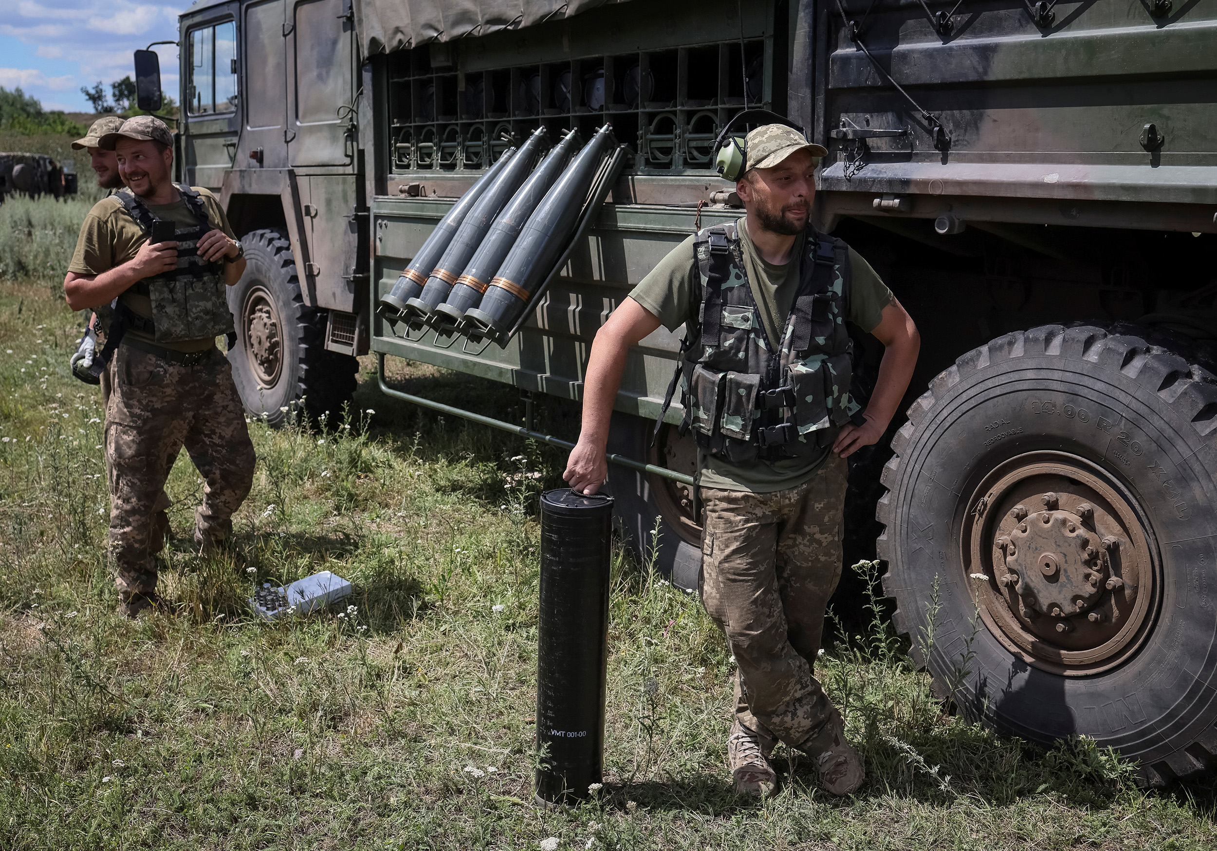 Ukrainian service members prepare to shoot from a towed howitzer FH-70 at a front line in the Donbas Region, Ukraine, on July 18.