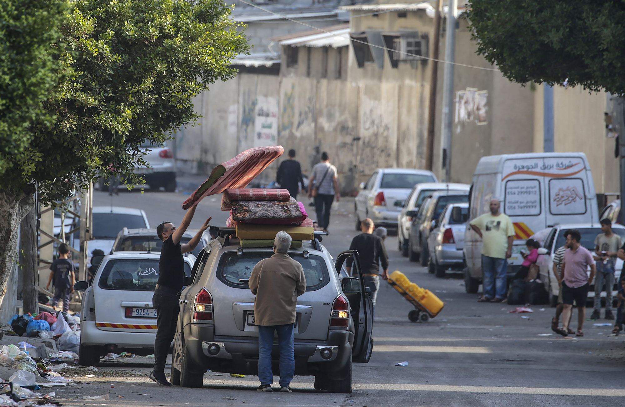 Residents prepare to evacuate Gaza City, on Saturday, October 14. 