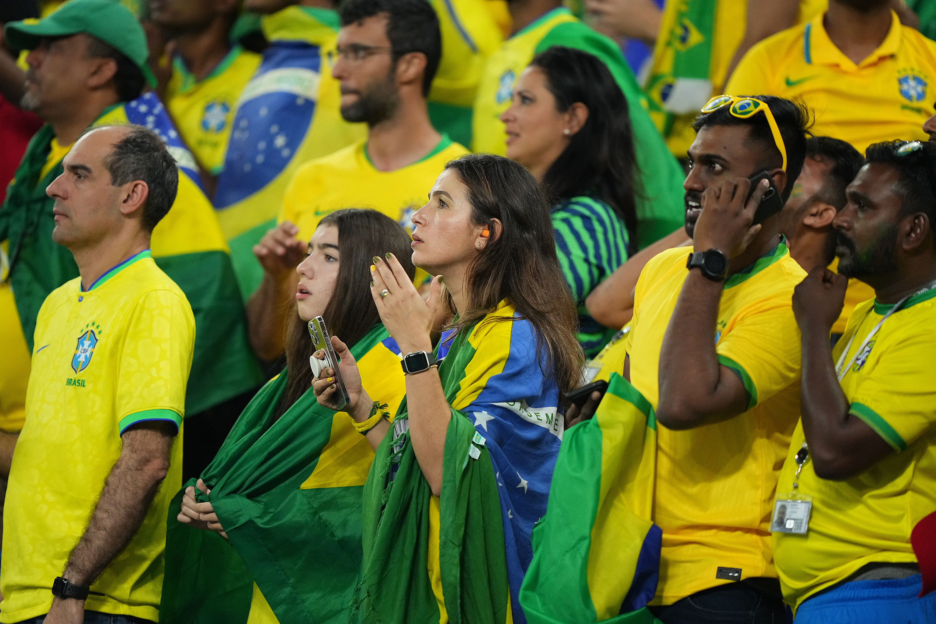 Brazil supporters react after a goal against Switzerland was declared invalid on Monday.