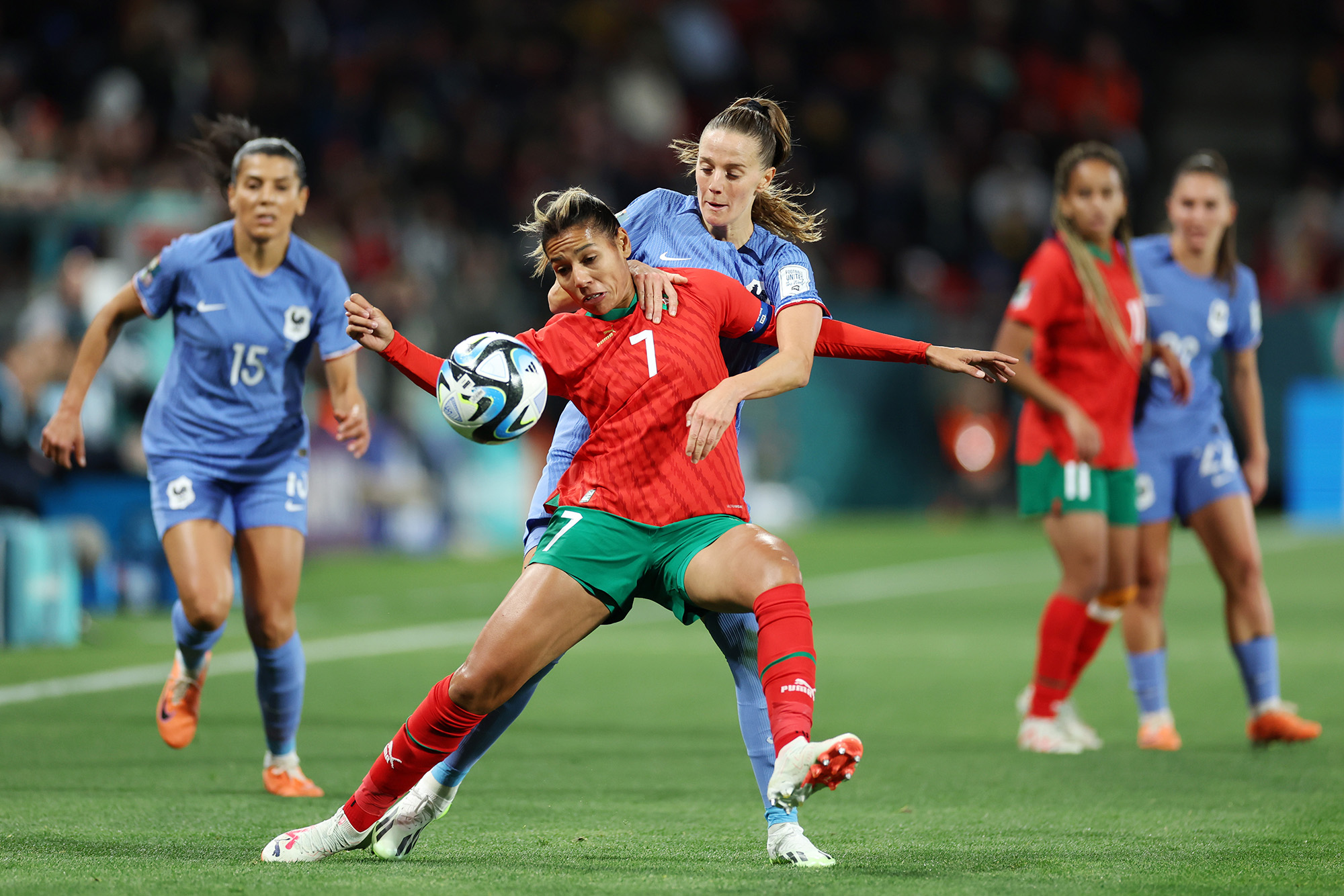 Morocco's Ghizlane Chebbak and Sandie Toletti of France compete for the ball during their Round of 16 match at Hindmarsh Stadium on August 8 in Adelaide, Australia.