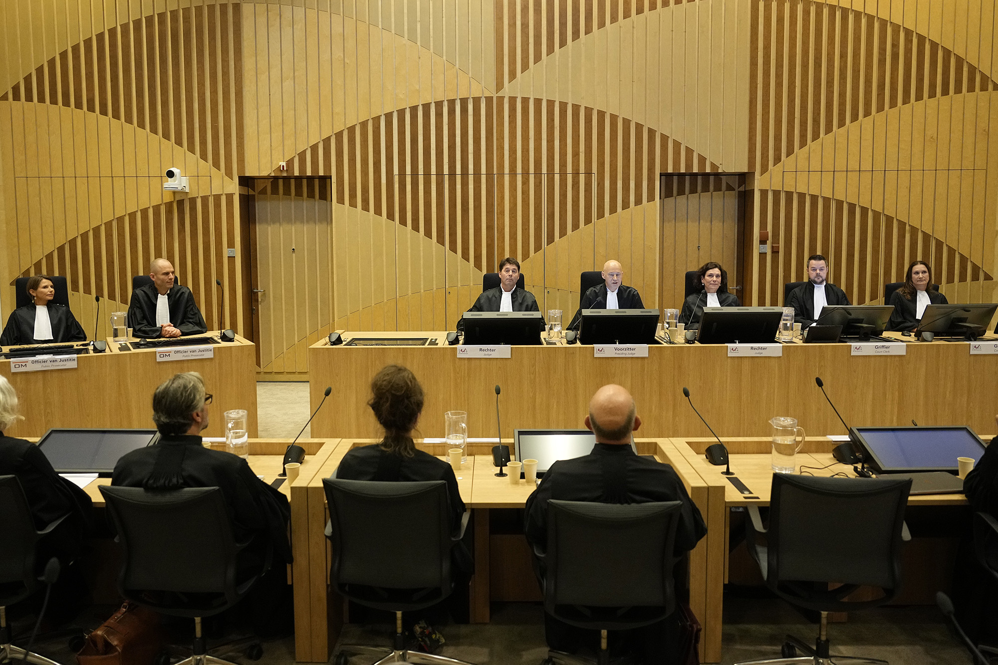 Presiding judge Hendrik Steenhuis, fourth from right, speaks during the verdict session of the Malaysia Airlines Flight 17 trial at the high security court at Schiphol airport, Netherlands, on November 17.