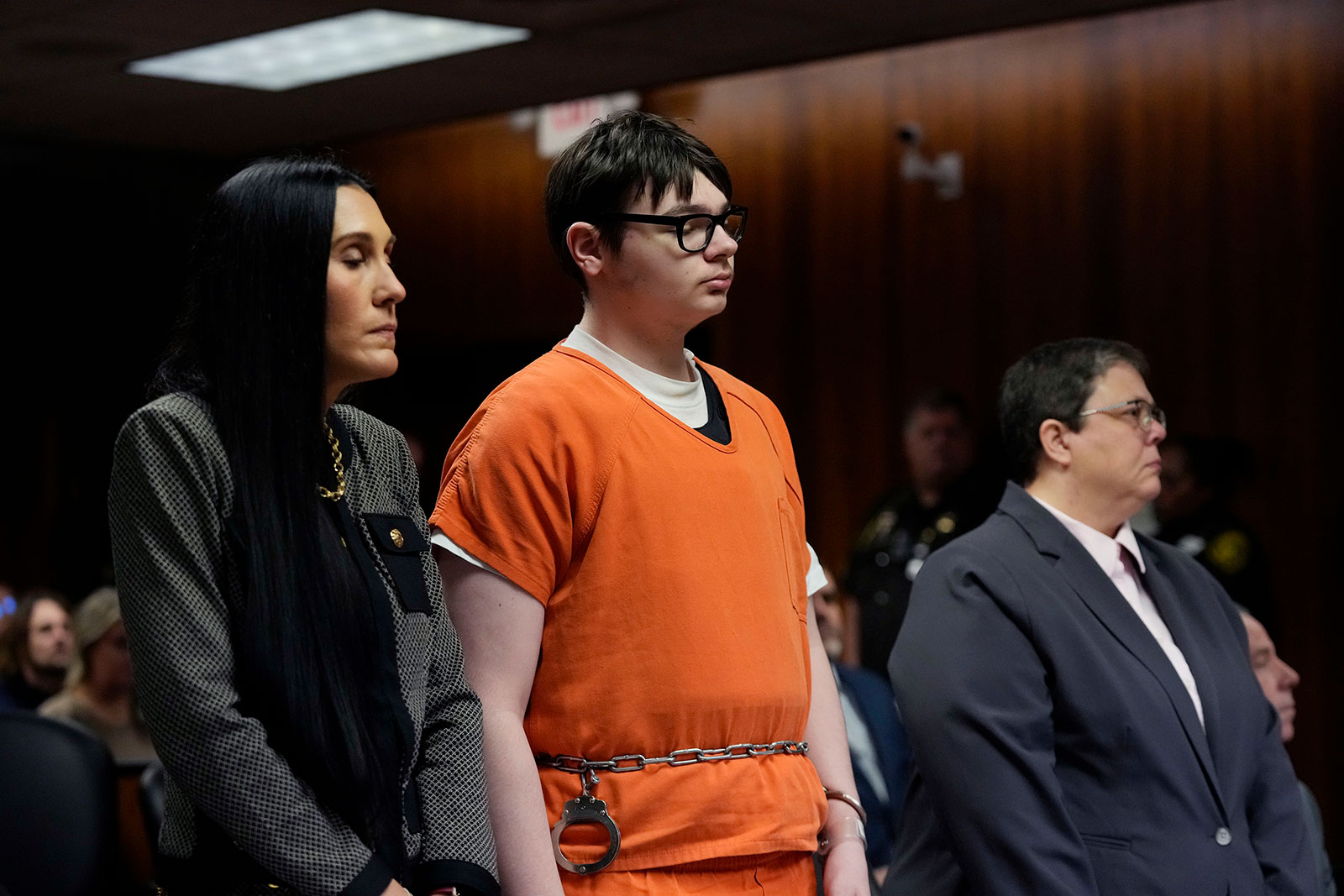 Ethan Crumbley stands with his attorneys in court on December 8, 2023, in Pontiac, Michigan.