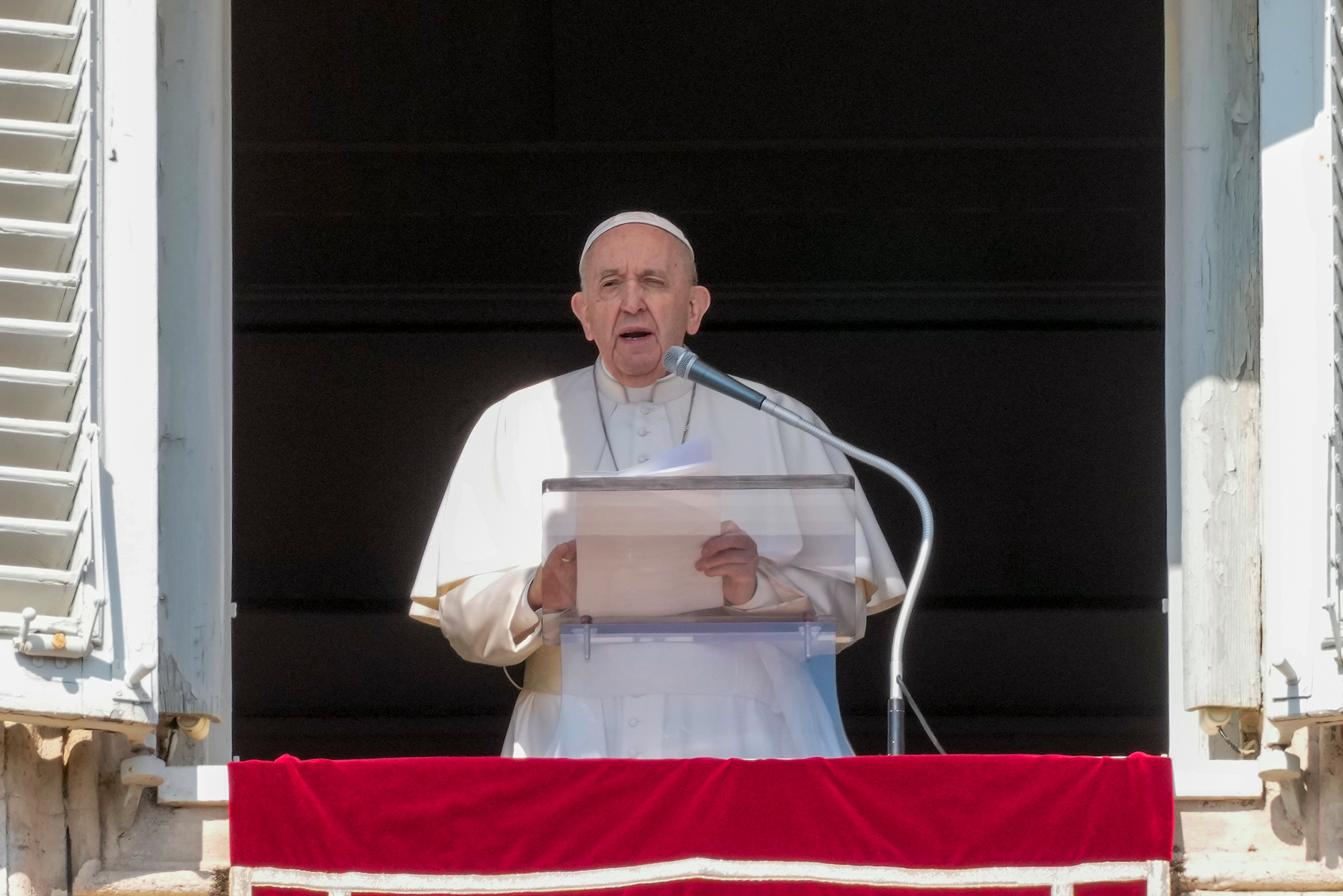 Pope Francis speaks from his studio overlooking St. Peter's Square, at the Vatican, on Sunday, March 6.