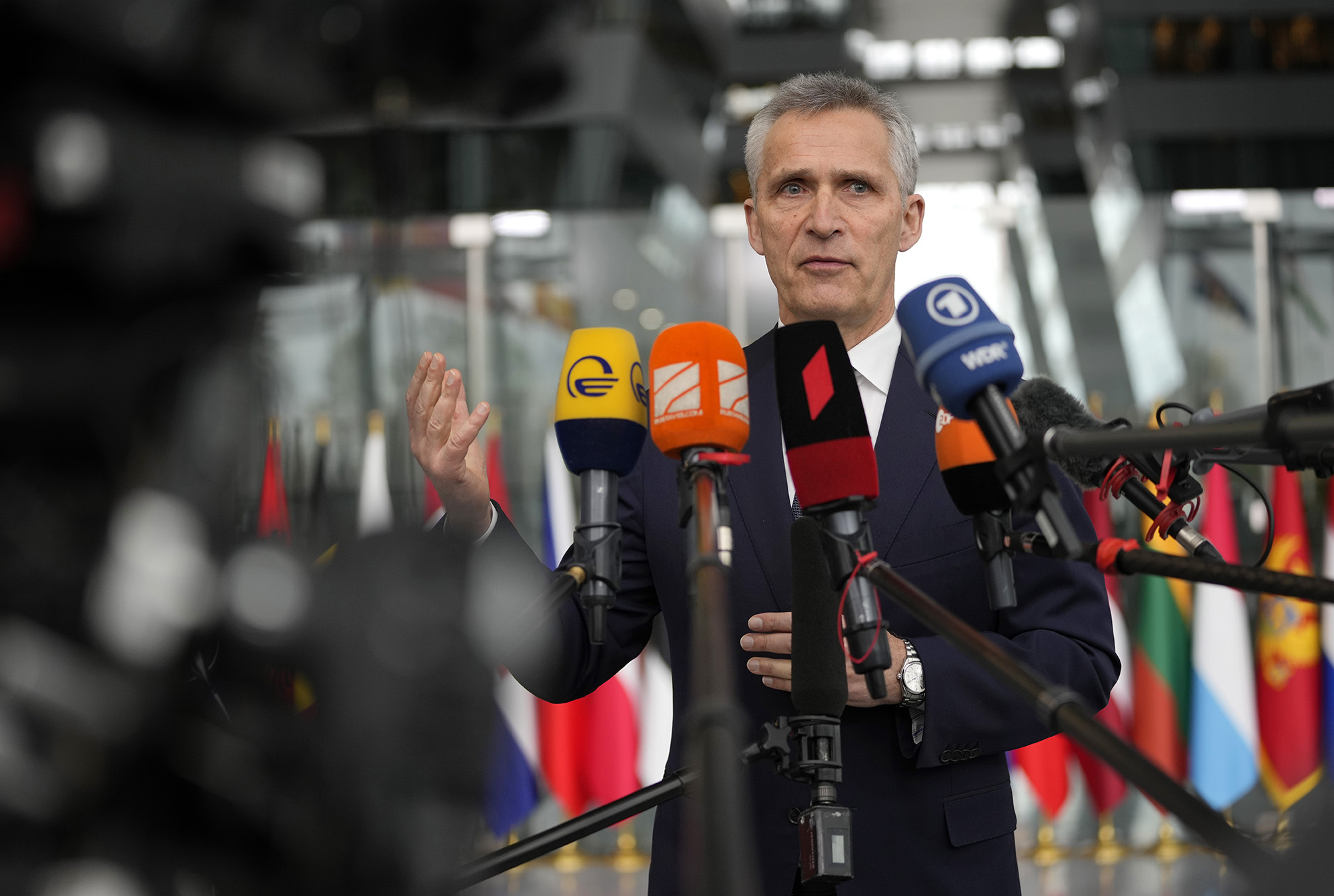 NATO Secretary General Jens Stoltenberg speaks as he arrives for a meeting of NATO foreign ministers at NATO headquarters in Brussels, Belgium, on April 6.