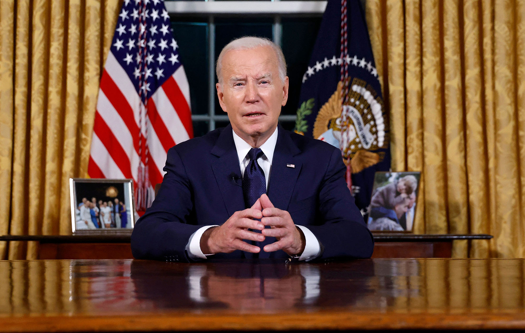 US President Joe Biden addresses the nation on the conflict between Israel and Gaza from the Oval Office of the White House in Washington, DC, on October 19.