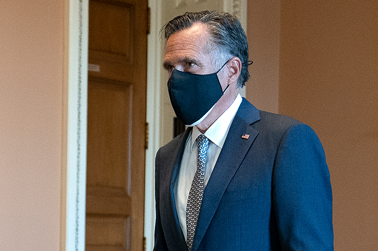 Sen. Mitt Romney walks to the Senate floor on Capitol Hill on Tuesday, October 20, in Washington, DC. 