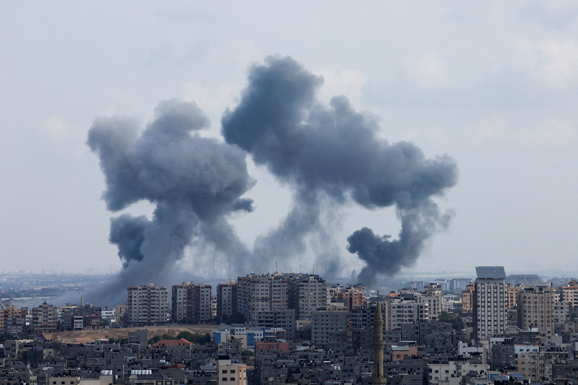 Smoke rises following Israeli strikes in Gaza on Tuesday.