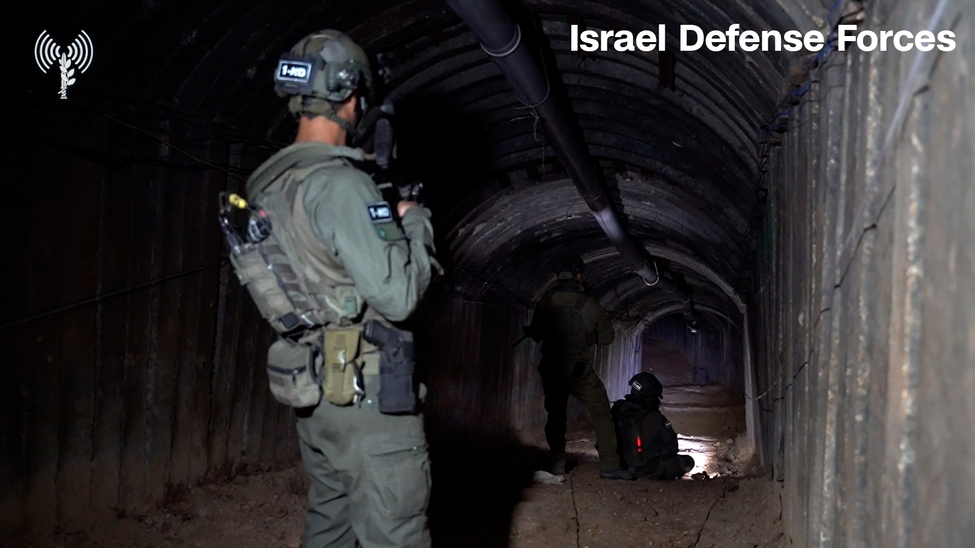 Israel Defense Forces soldiers gain access to a Hamas tunnel in Gaza in this screengrab from an undated video released by the IDF.