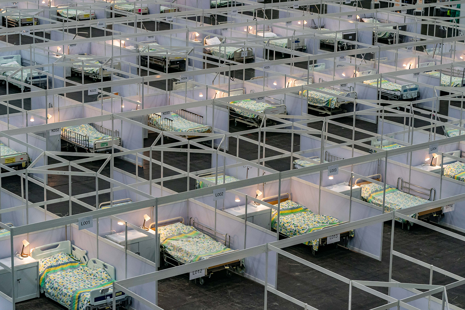 Beds are seen at a temporary field hospital set up at Asia World Expo in Hong Kong, China on August 1. AsiaWorld-Expo has been converted into a makeshift hospital that can take up to 500 patients. 