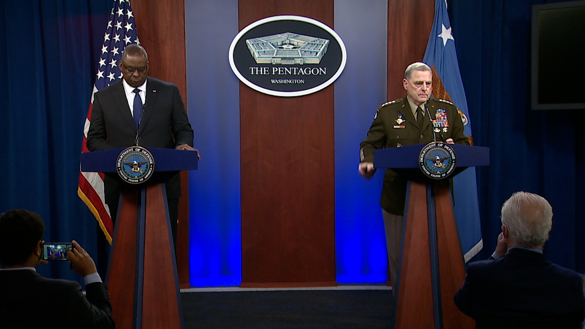 Secretary of Defense Lloyd Austin, left, and Chairman of the Joint Chiefs of Staff Gen. Mark Milley speak during a press briefing at the Pentagon in Washington, DC, on August 18.