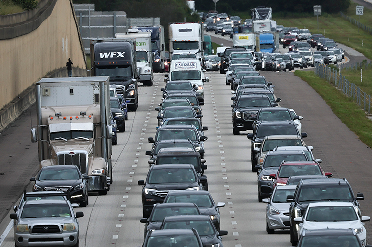 Traffic moves slowly on I-4 East as residents evacuate the Gulf Coast of Florida in advance of the arrival of Hurricane Ian on Tuesday, September 27, in Four Corners, Florida. 