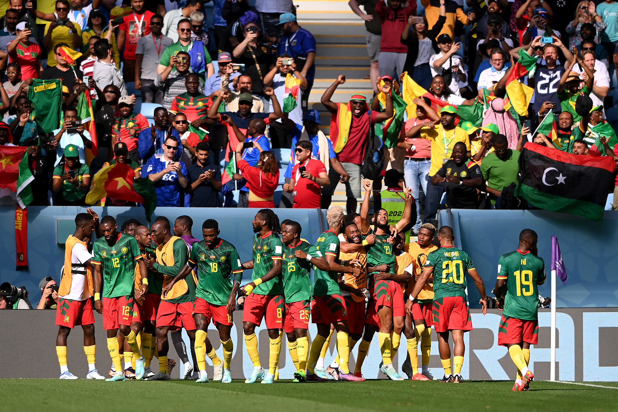 Jean-Charles Castelletto of Cameroon celebrates with teammates after scoring their team's first goal during the FIFA World Cup Qatar 2022 Group G match between Cameroon and Serbia at Al Janoub Stadium on November 28.
