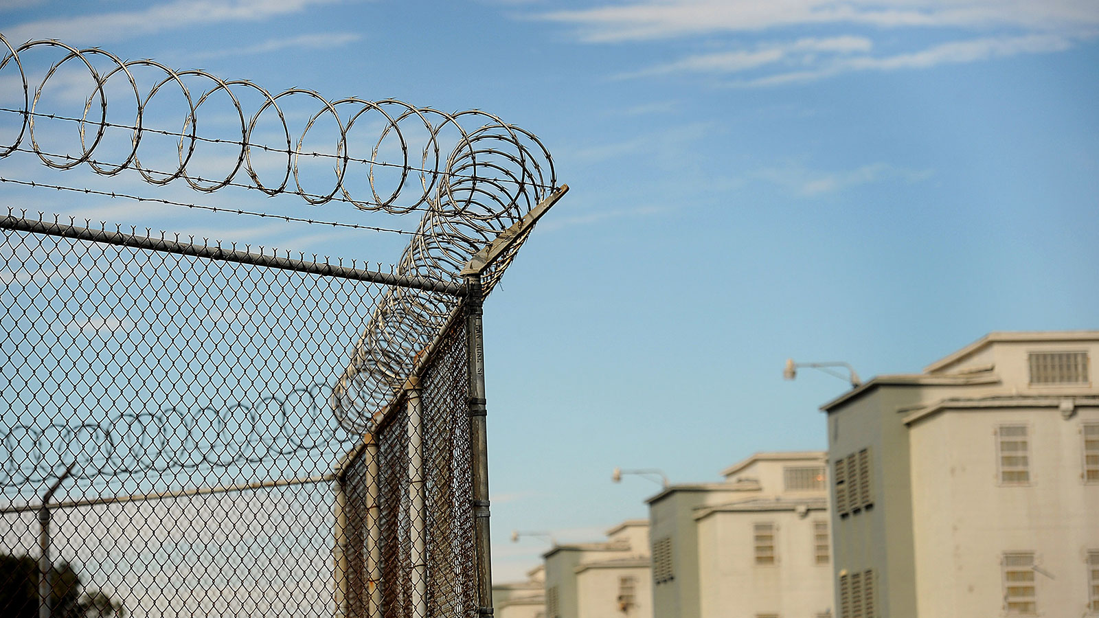 In this 2011 file photo, barbed wire marks the perimeter of a California Department of Corrections and Rehabilitation facility in Tracy, California. 