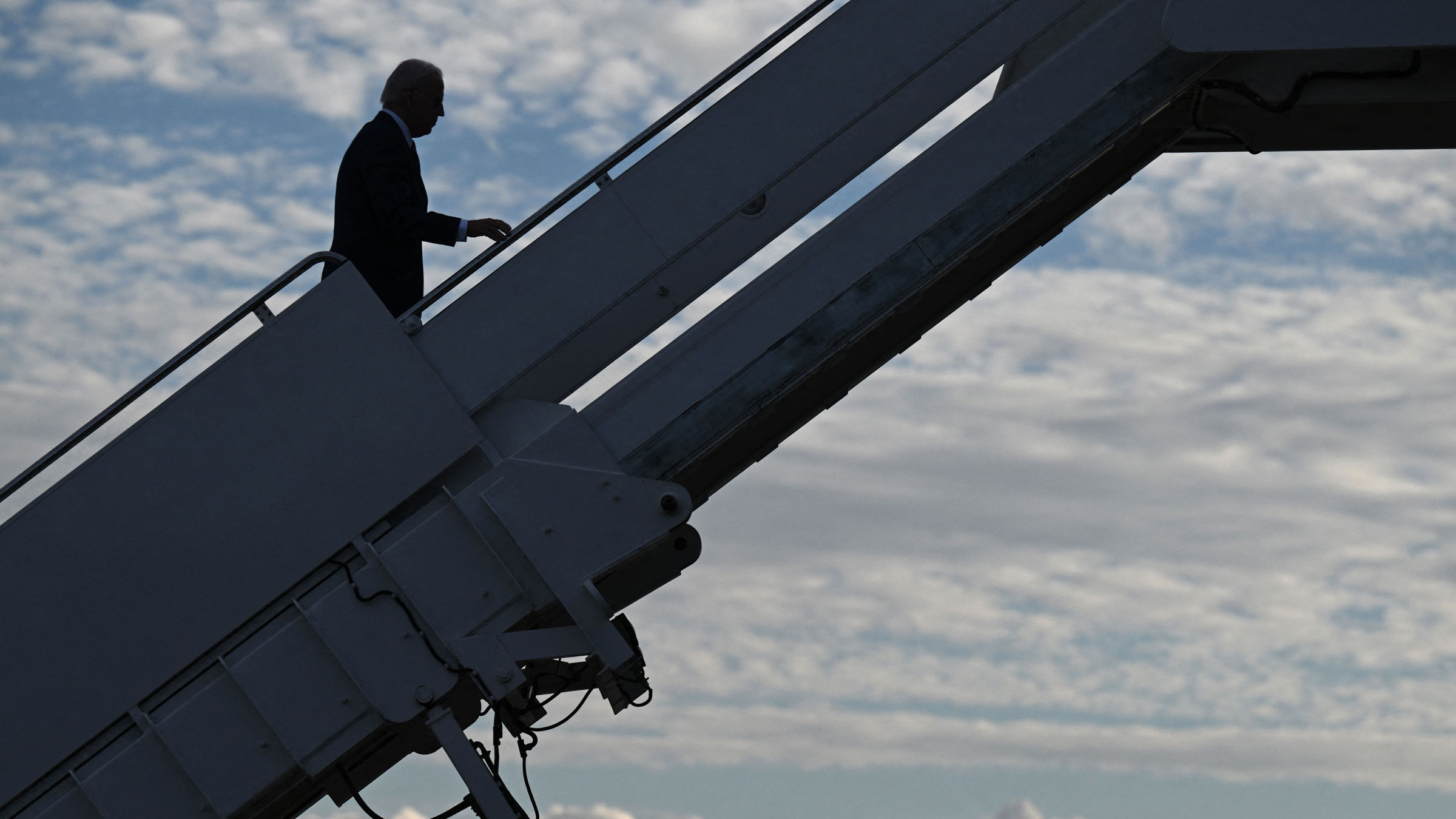 President Joe Biden boards Air Force One in Glendale, Arizona, on Tuesday.