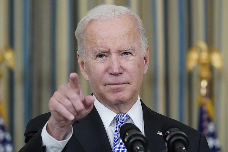 President Joe Biden calls on reporters for questions as he speaks about the bipartisan infrastructure bill in the State Dinning Room of the White House, Saturday, Nov. 6, 2021, in Washington.