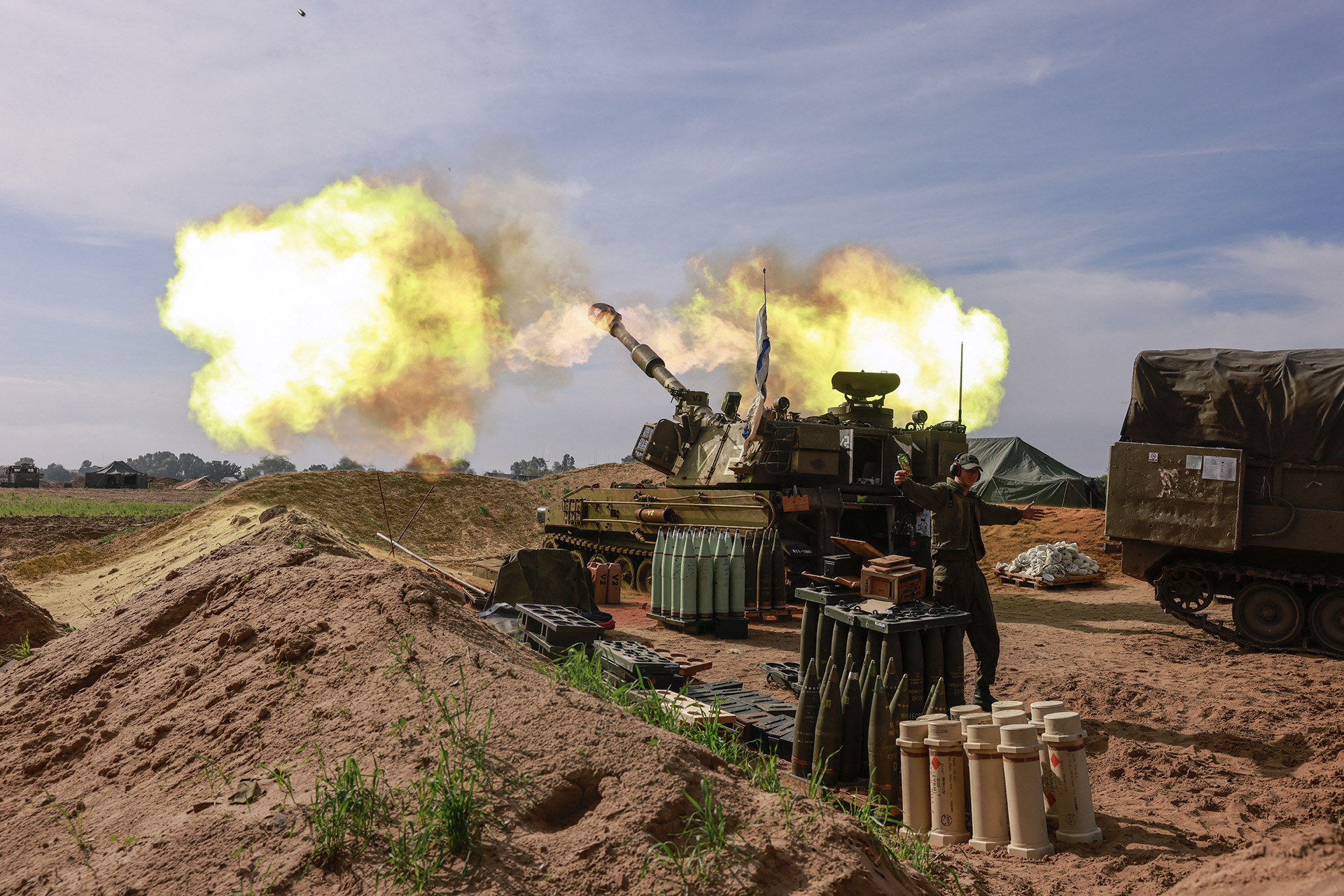 Israeli artillery firing towards Gaza from southern Israel on December 20.