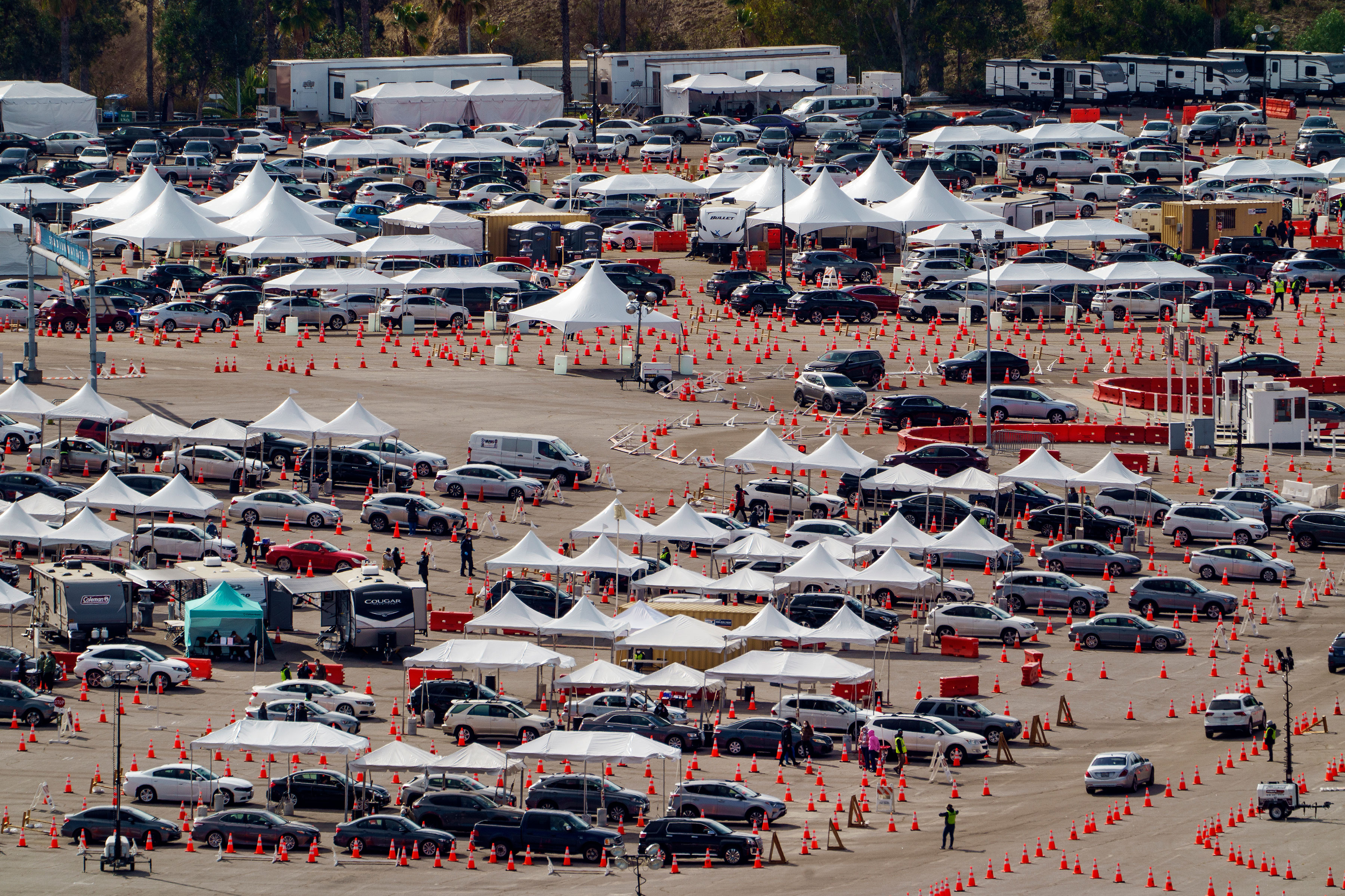 Drivers wait in line at a Covid-19 vaccination site in the parking lot of Dodger Stadium in Los Angeles on January 27.