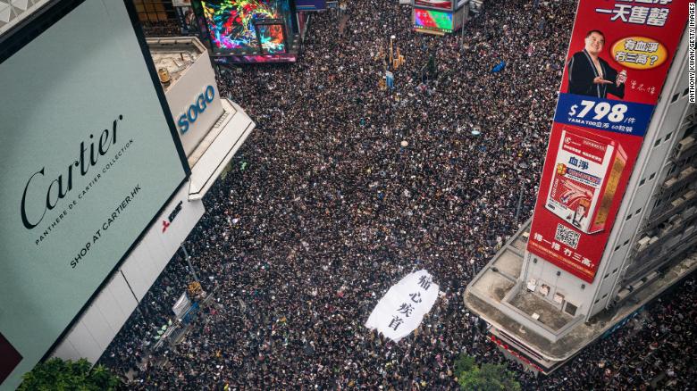 Protesters fill the streets of Hong Kong on Sunday.