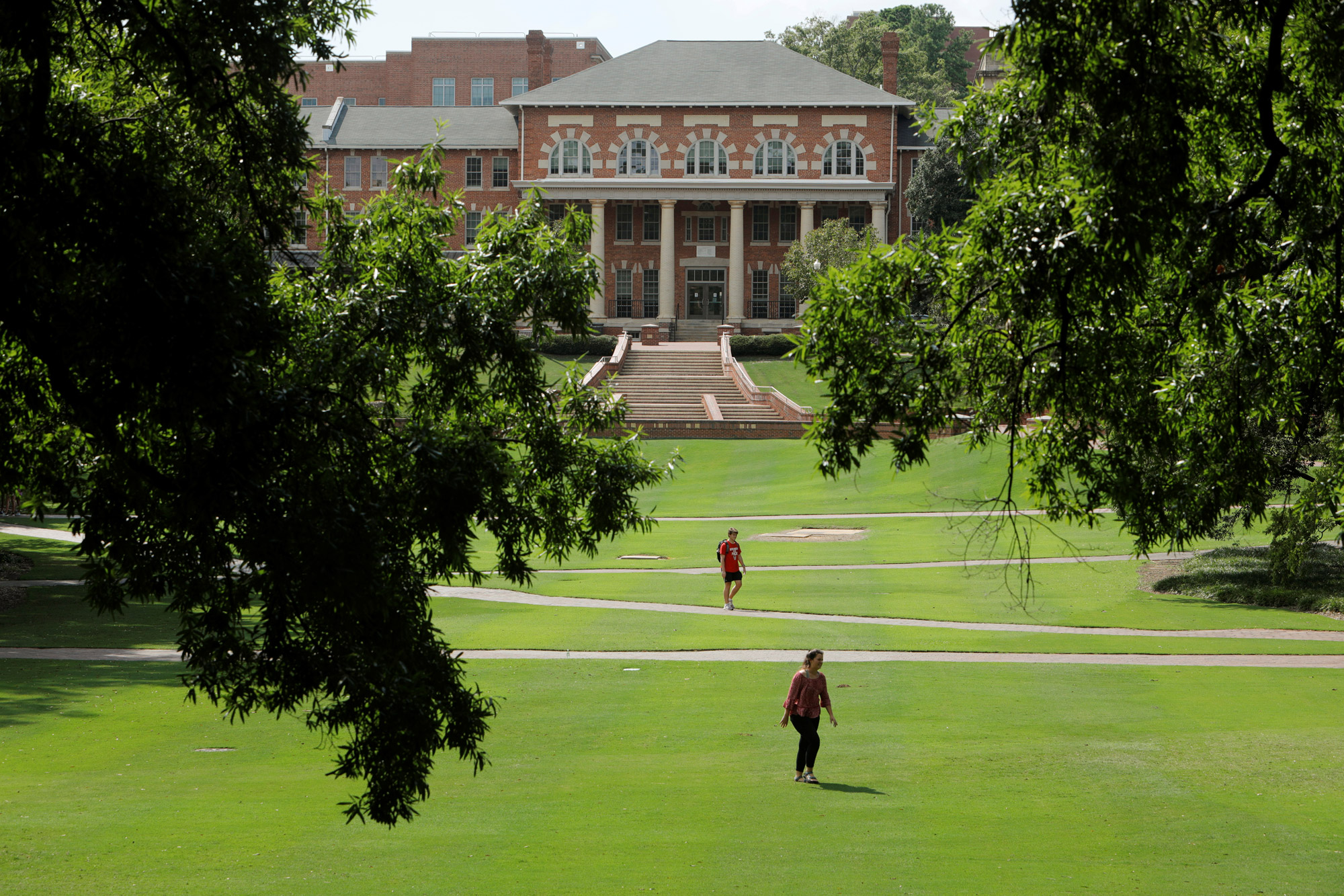 Students walk at the campus of North Carolina State University in Raleigh on August 7. 