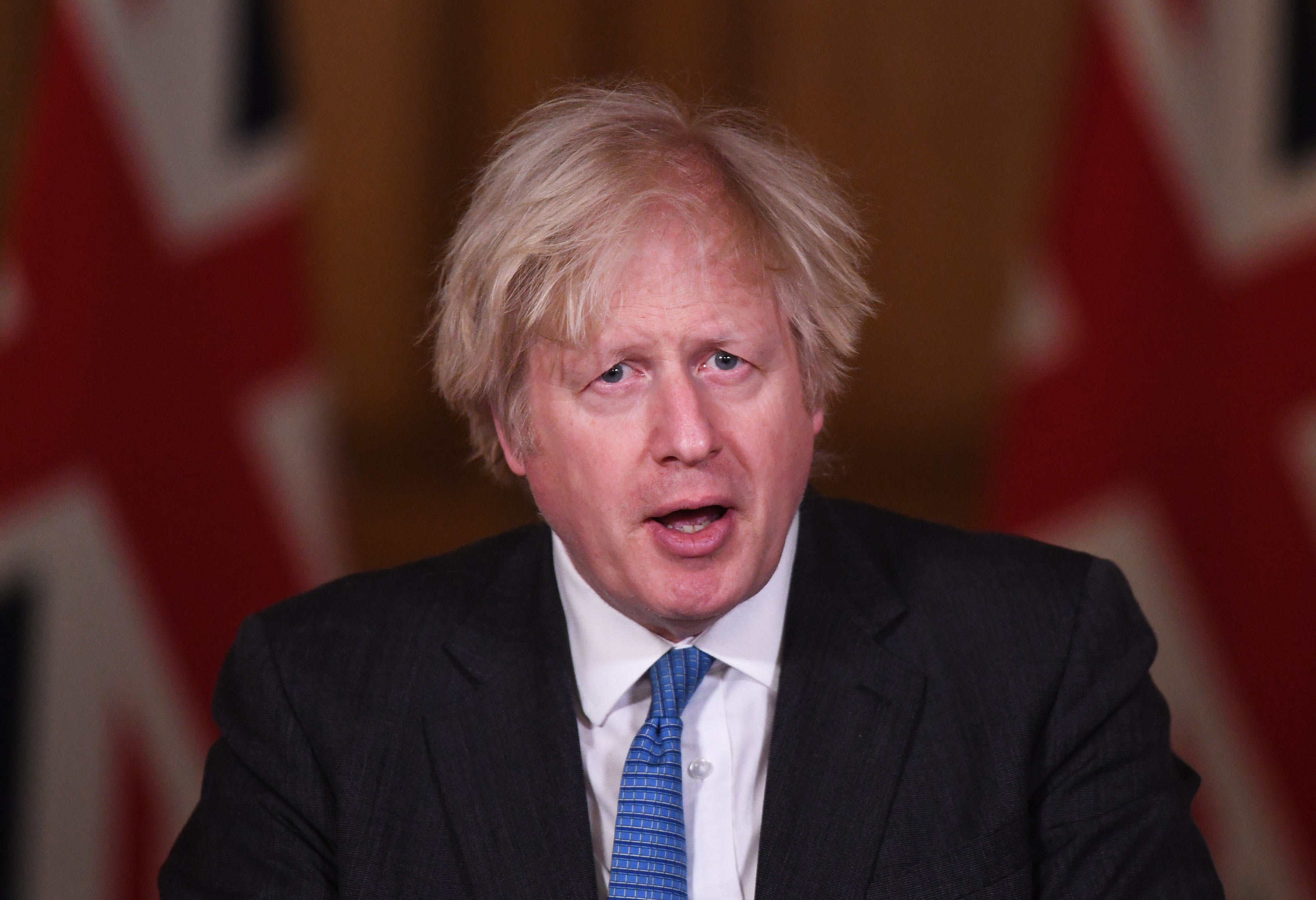 UK Prime Minister Boris Johnson talks during a Covid-19 media briefing in Downing Street on February 15 in London.