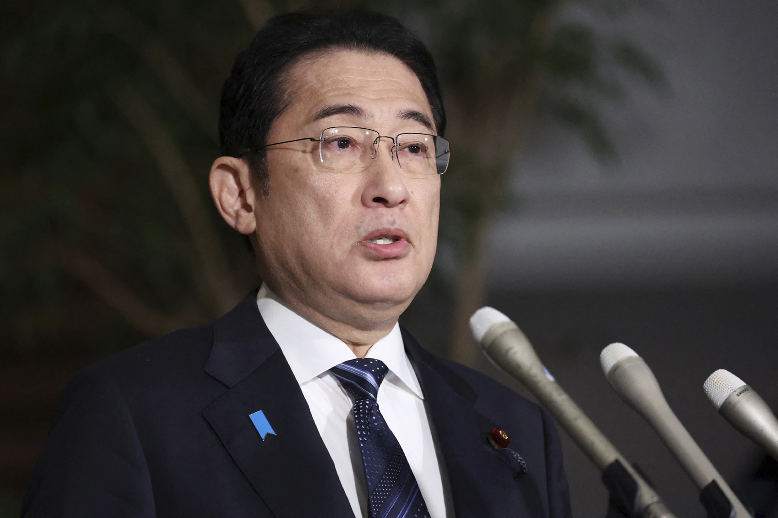 Japanese Prime Minister Fumio Kishida speaks to the media at the prime minister's office in Tokyo, following the earthquake on January 1. 