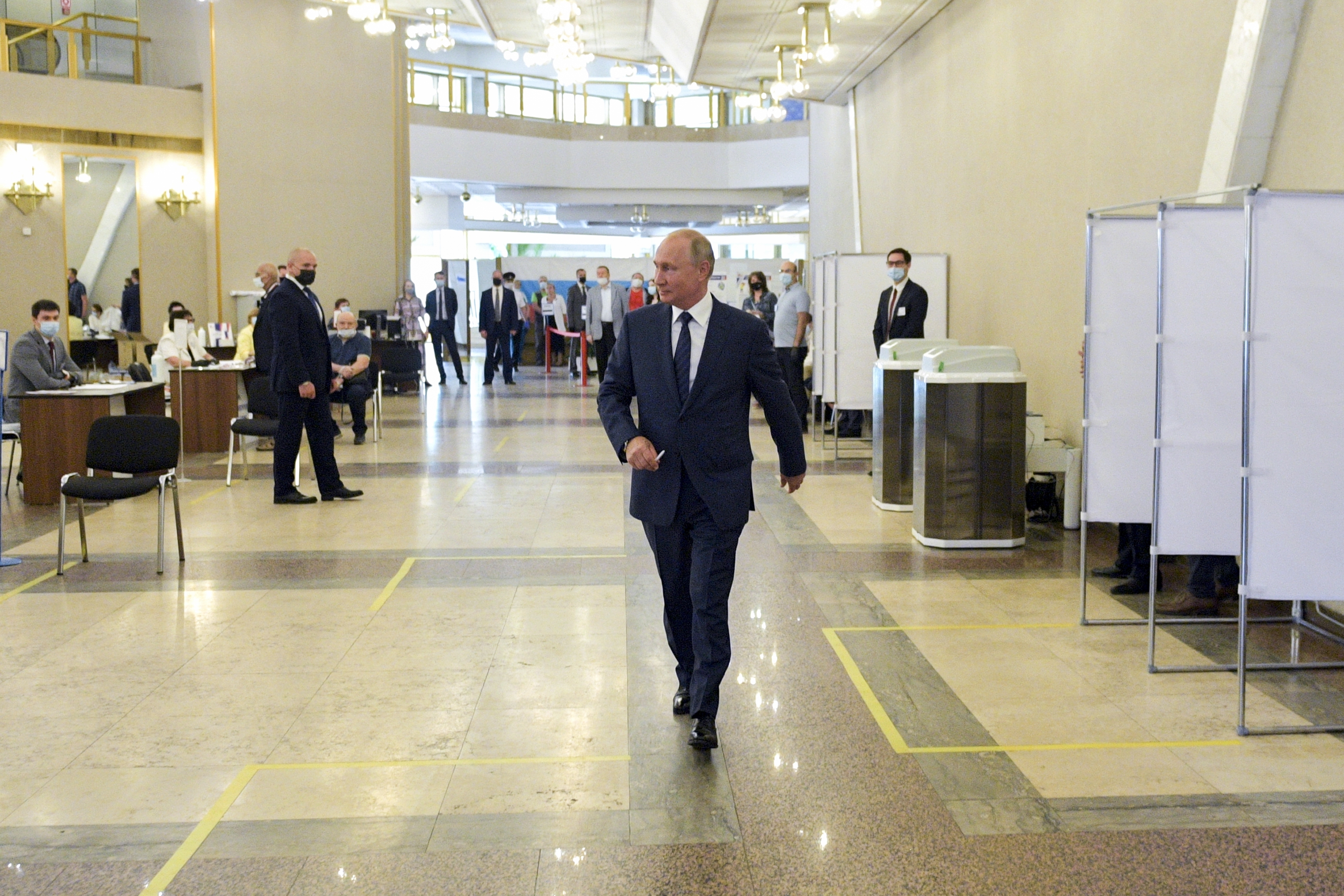 Russian President Vladimir Putin arrives to take part in voting at a polling station in Moscow, Russia, on Wednesday, July 1.
