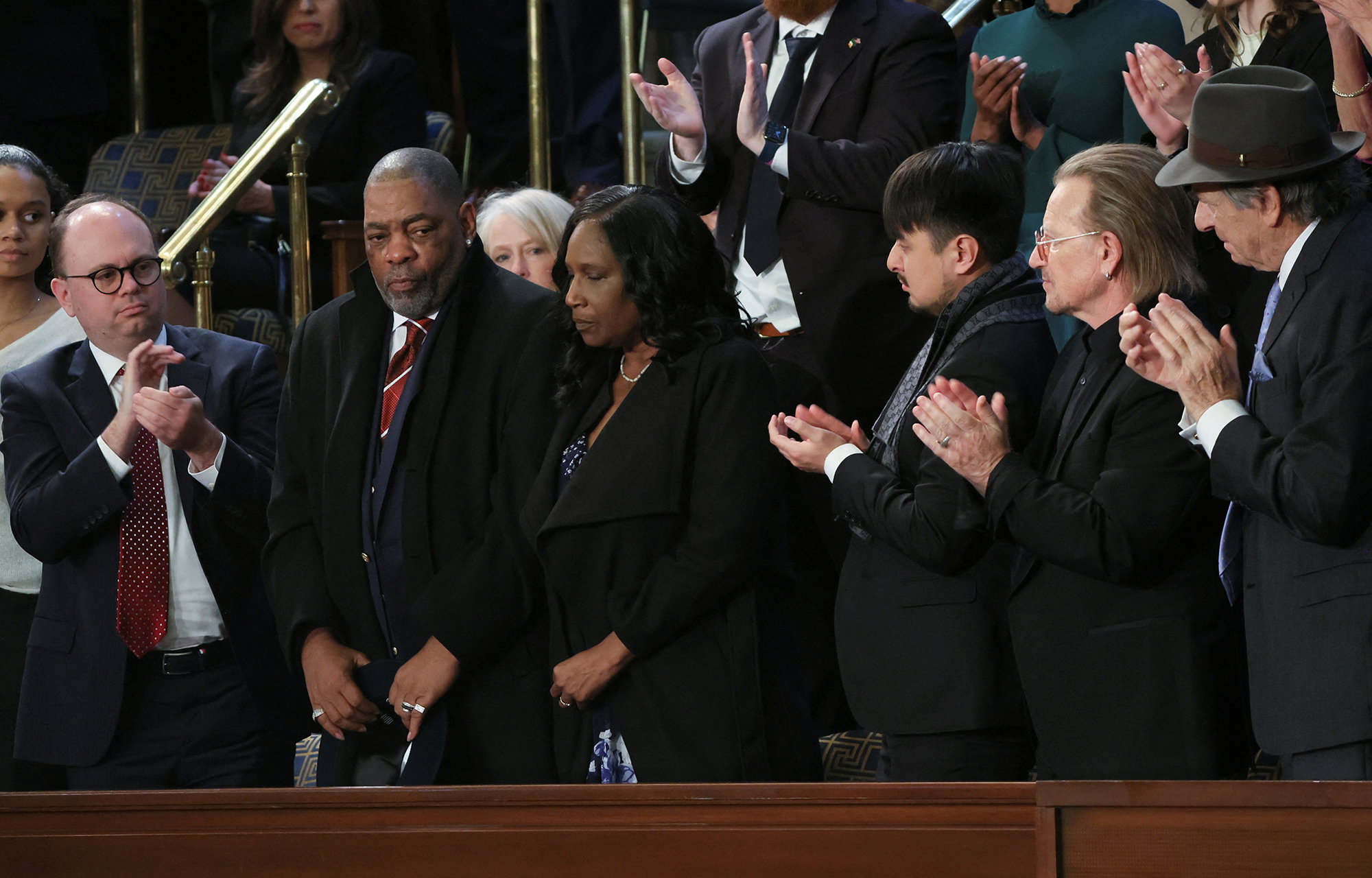 Rodney Wells and RowVaughn Wells, the stepfather and mother of Tyre Nichols, a Black motorist who died after being beaten by Memphis police following a traffic stop wait with are applauded in the first lady's box of the House visitors gallery as President Joe Biden talks about Tyre Nichols and police violence during his State of the Union address.