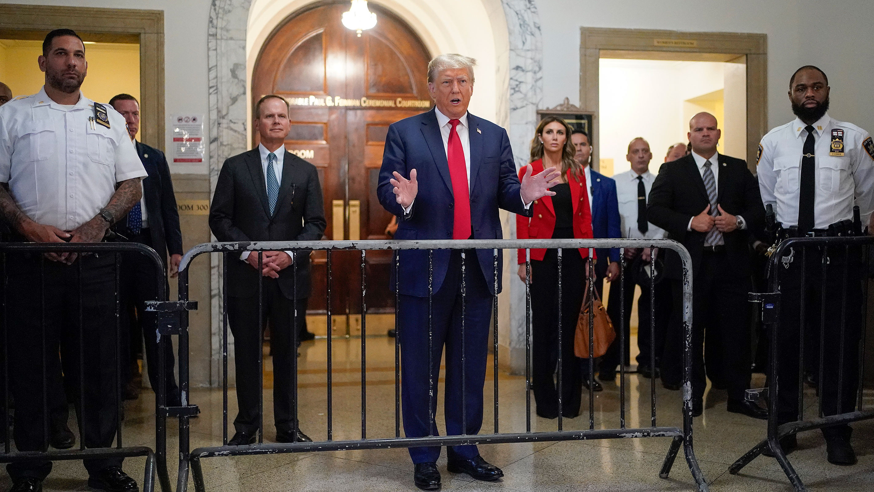 Former President Donald Trump speaks to the media before entering the courtroom at New York Supreme Court on Tuesday in New York. 