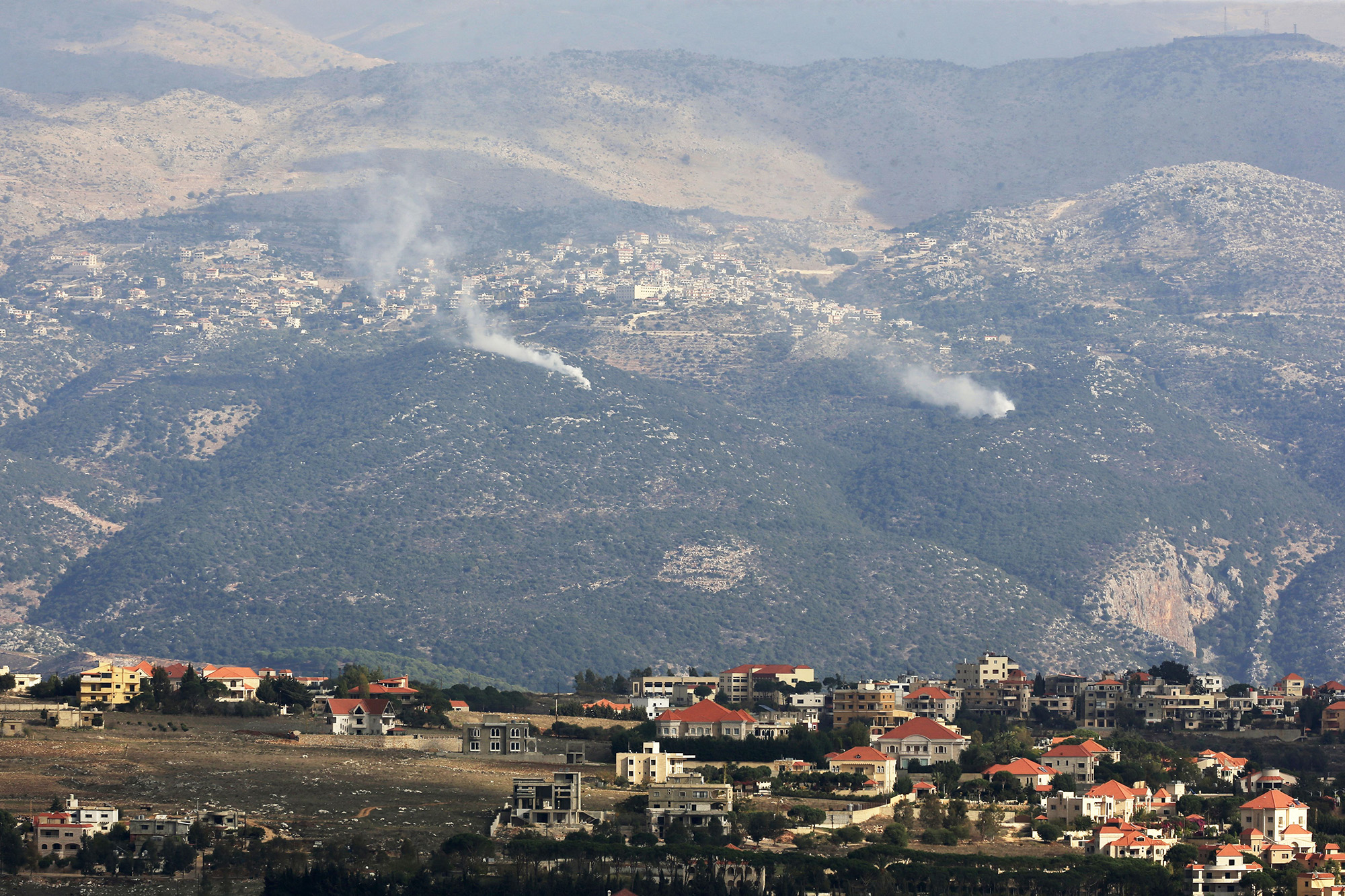 Smoke rises following Israeli artilley shelling along Lebanon's southern border with northern Israel on November 16.