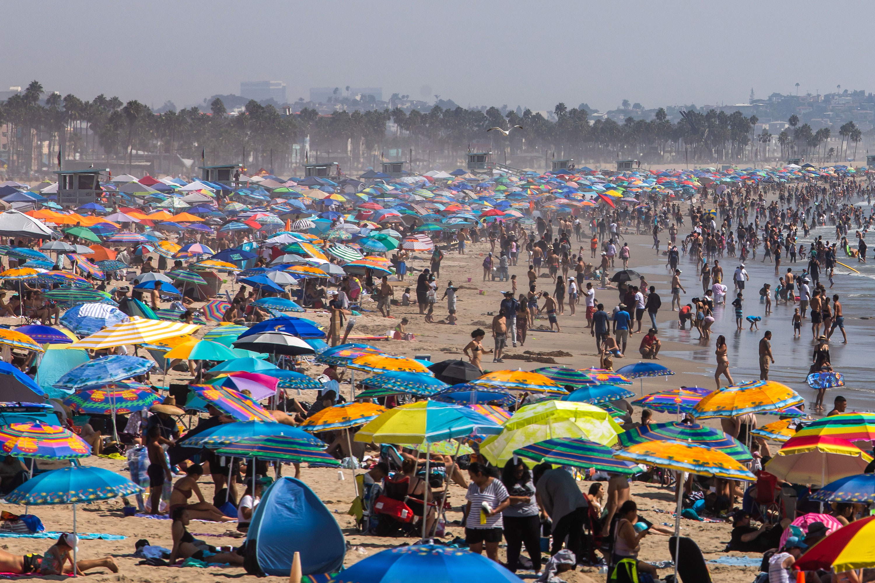 People gather on the beach on September 6 in Santa Monica, California.