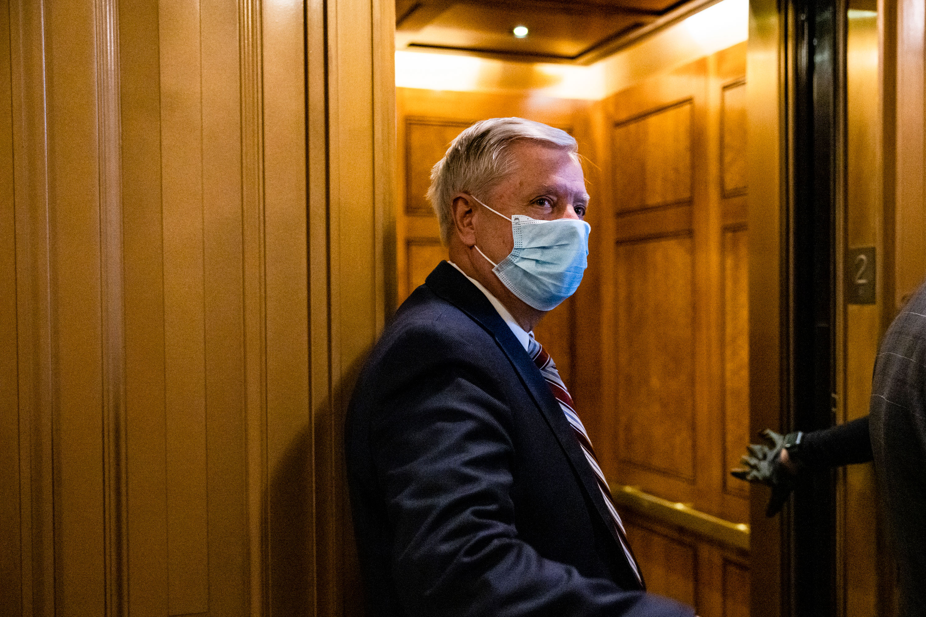 Sen. Lindsey Graham leaves the floor of the Senate on January 26.