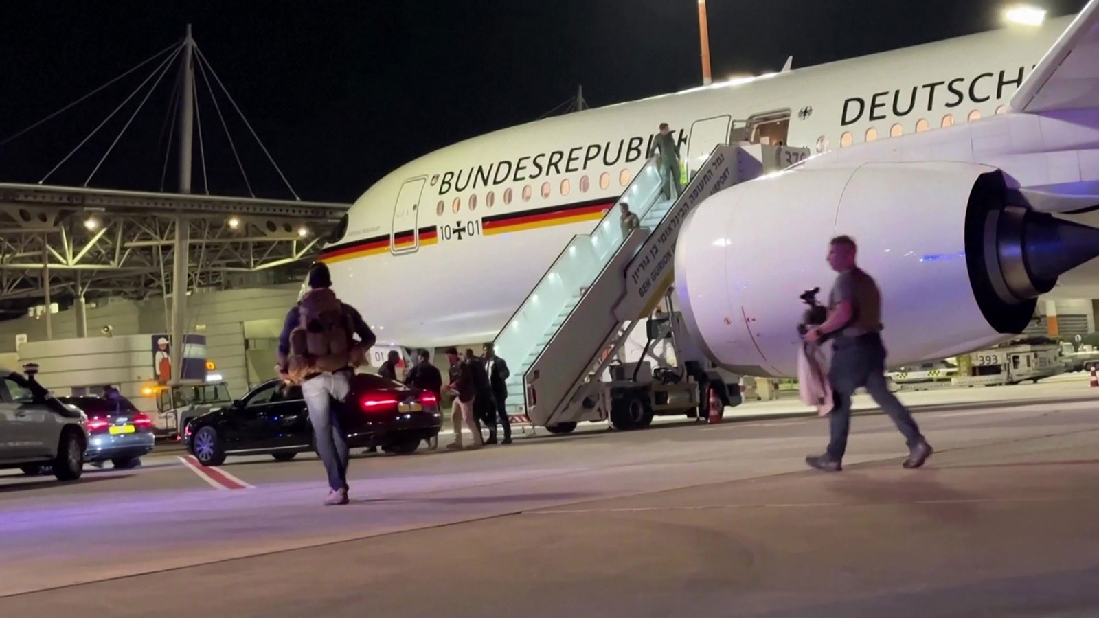German Chancellor Olaf Scholz's plane was evacuated due to an air raid alert late Tuesday night, a Reuters correspondent traveling with the chancellor reported.  
