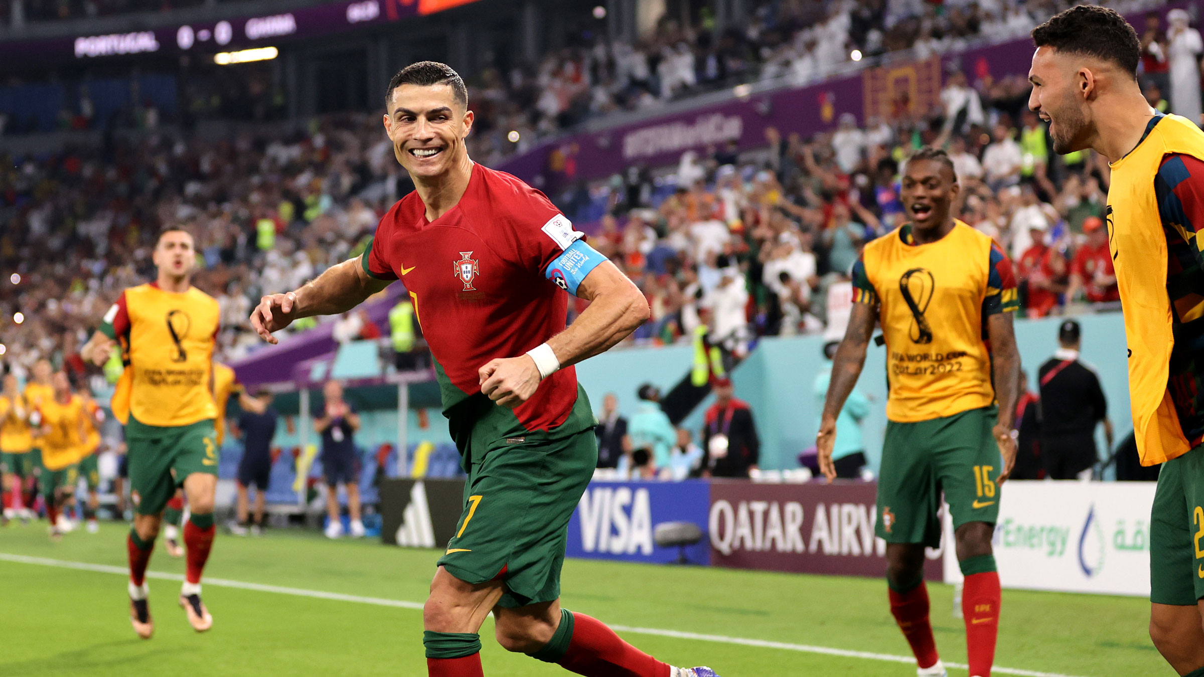 Cristiano Ronaldo celebrates with teammates after scoring a second-half penalty against Ghana on Thursday.