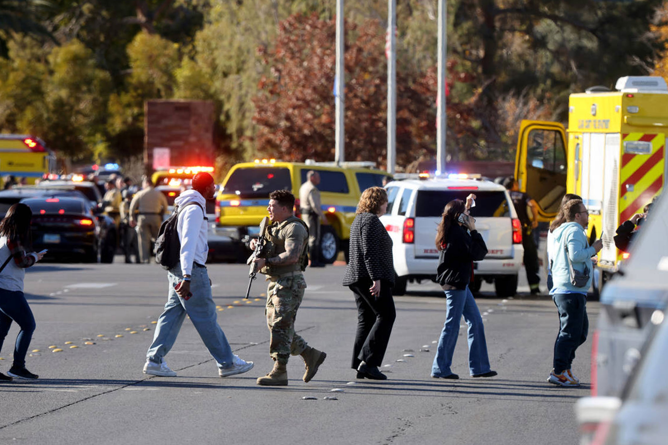 Police evacuate students after a shooting at the University of Nevada, Las Vegas, on Wednesday. 