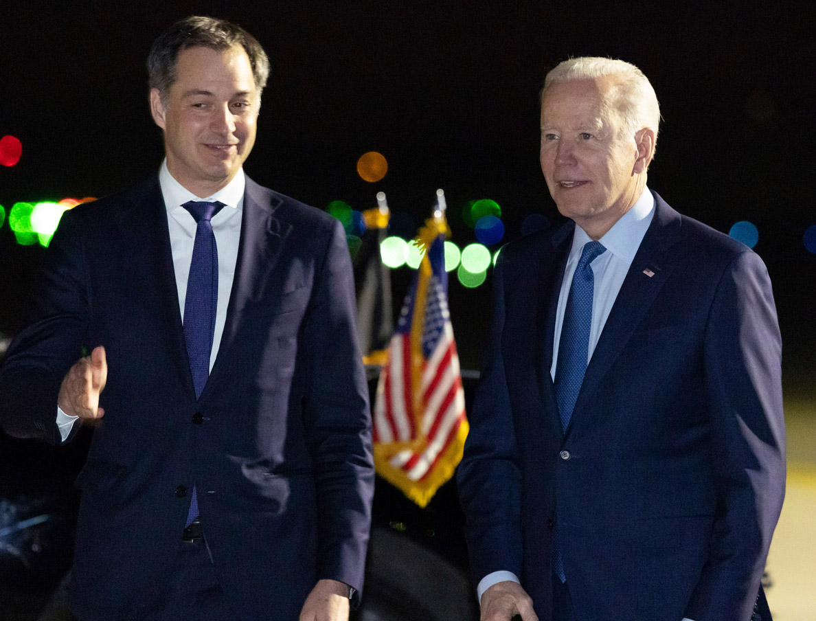 Belgian Prime Minister Alexander De Croo greets President Joe Biden as he arrives at Melsbroek Air Base in Belgium on Wednesday.
