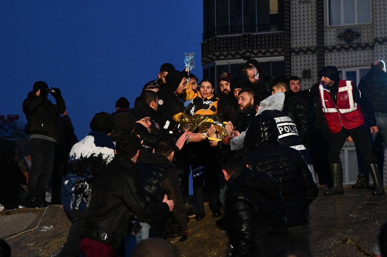 Rescue teams pull the wounded people out of the wreckage of the collapsed building in Gaziantep, Turkey, on February 6.