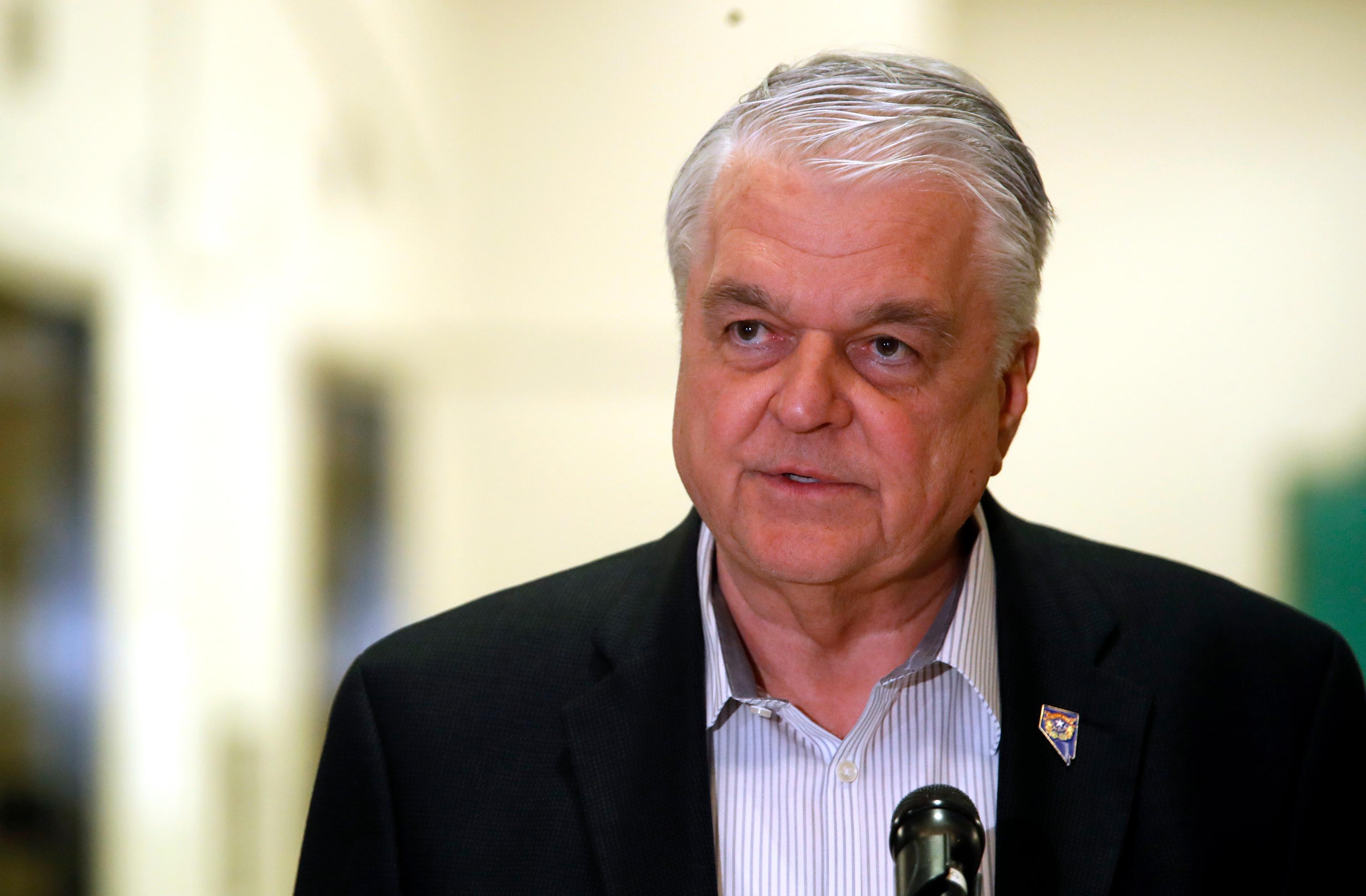 Nevada Gov. Steve Sisolak speaks during a news conference in Las Vegas on March 17.